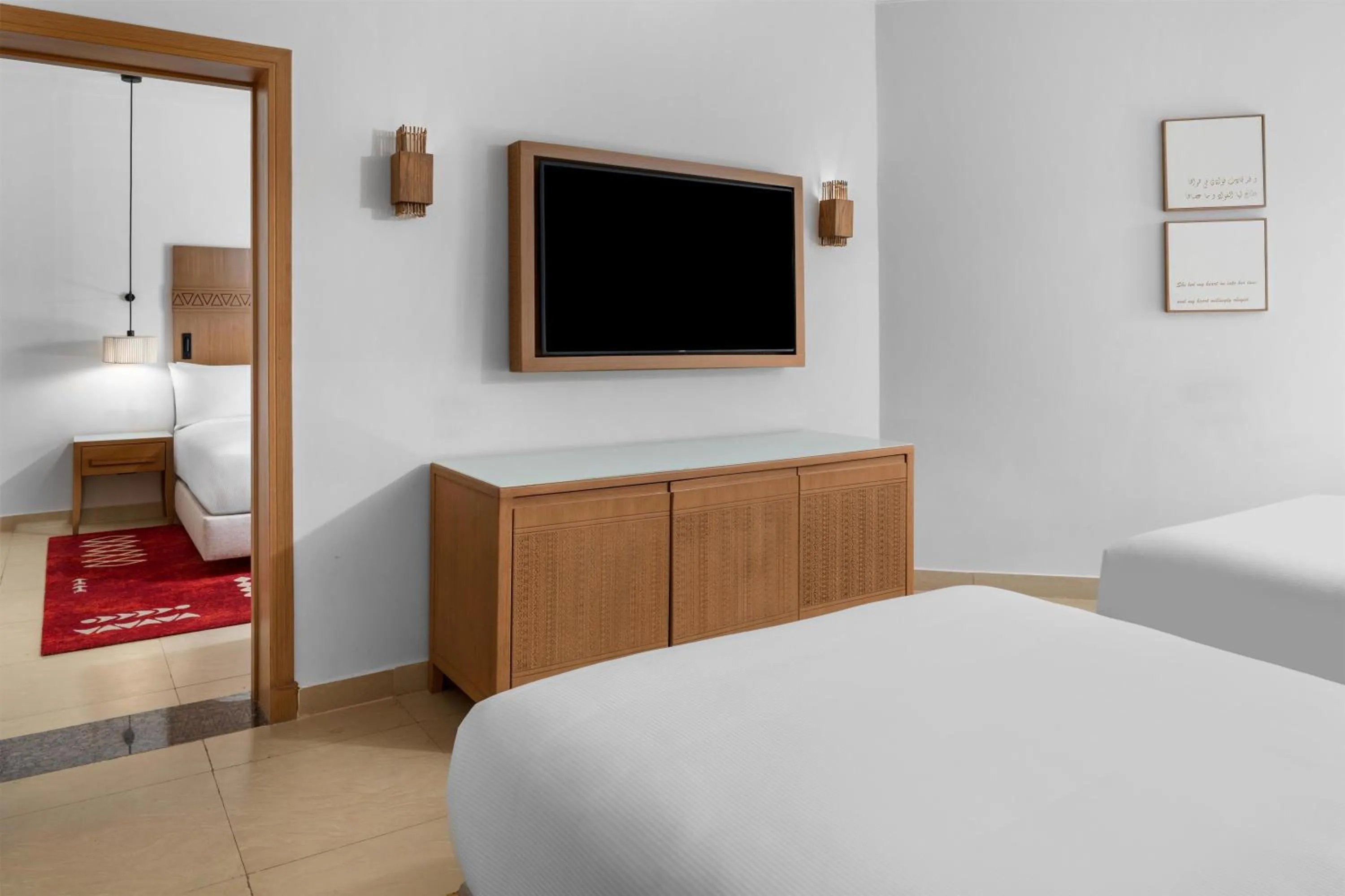 Bed in DoubleTree by Hilton Sharks Bay Resort