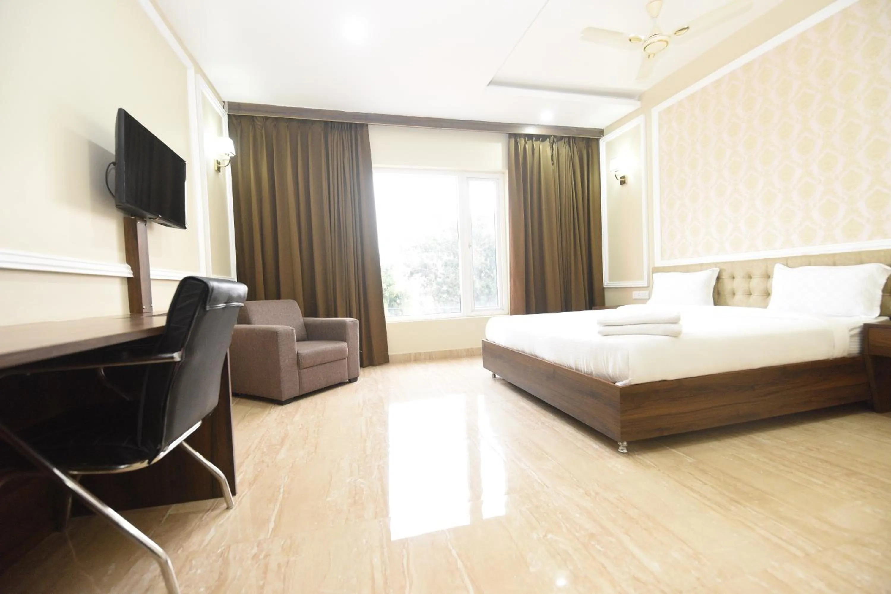 Photo of the whole room, Bed in Hotel Nilay Residency
