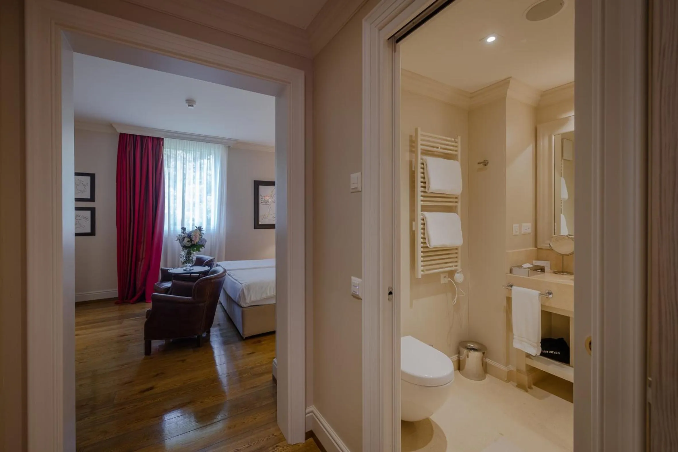 Toilet, Bed in Resort Collina d'Oro - Hotel, Residence & Spa