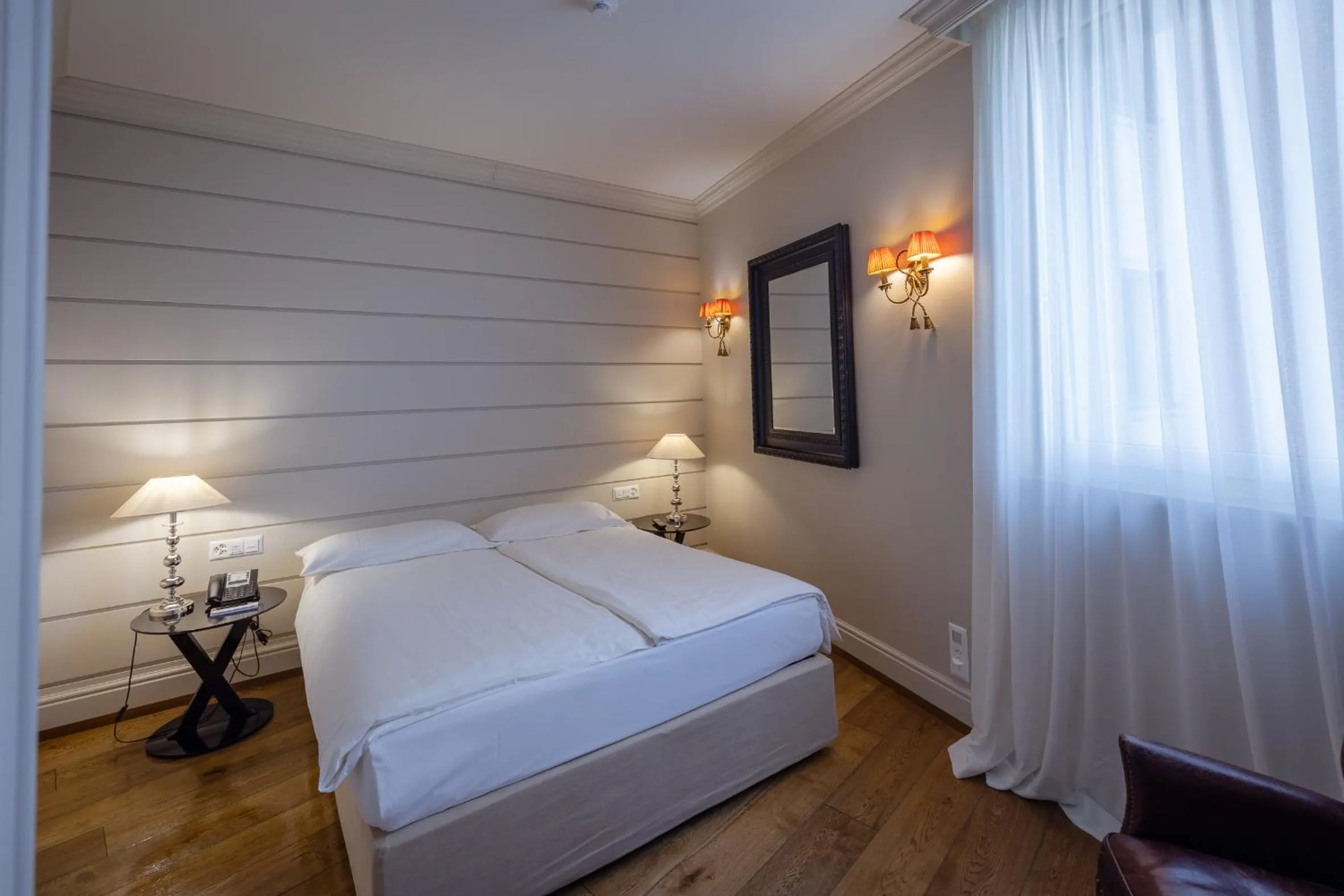 Bedroom, Bed in Resort Collina d'Oro - Hotel, Residence & Spa