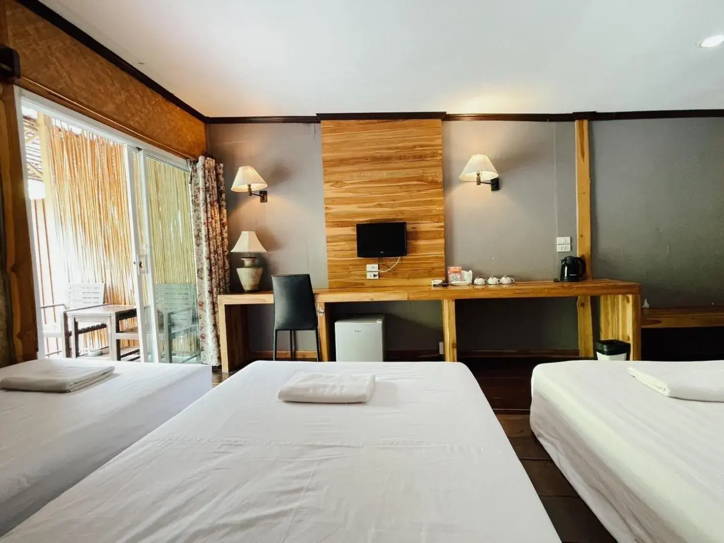 Bed in The Hub Erawan Resort Bed in The Hub Erawan Resort