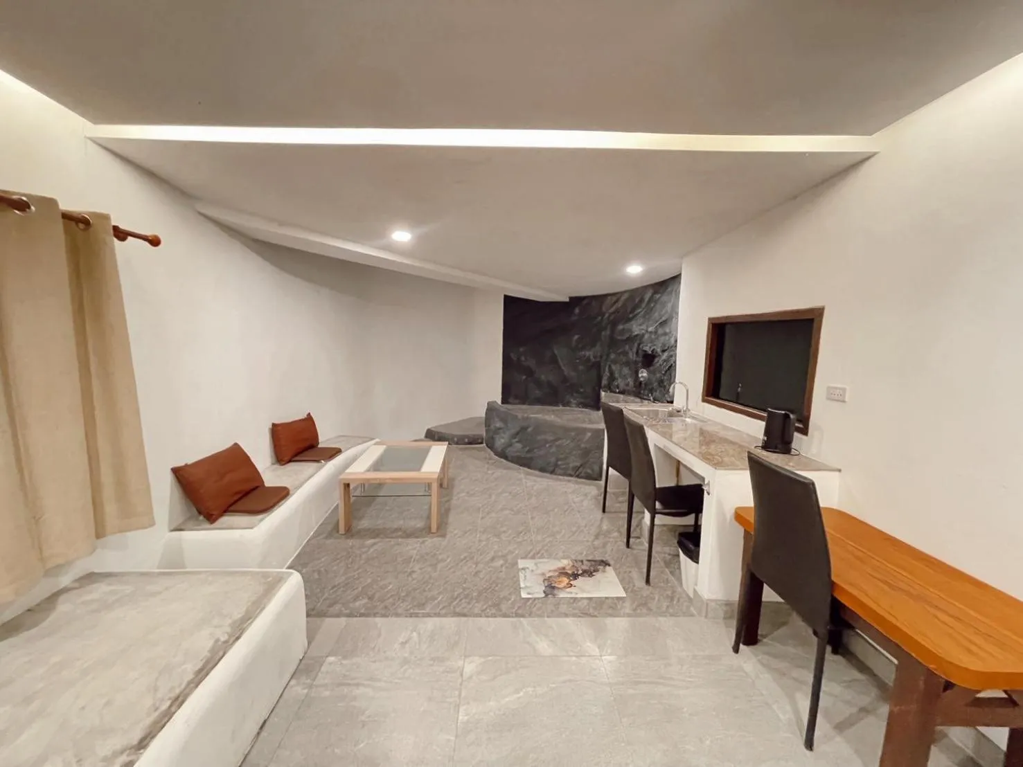 Seating area in The Hub Erawan Resort