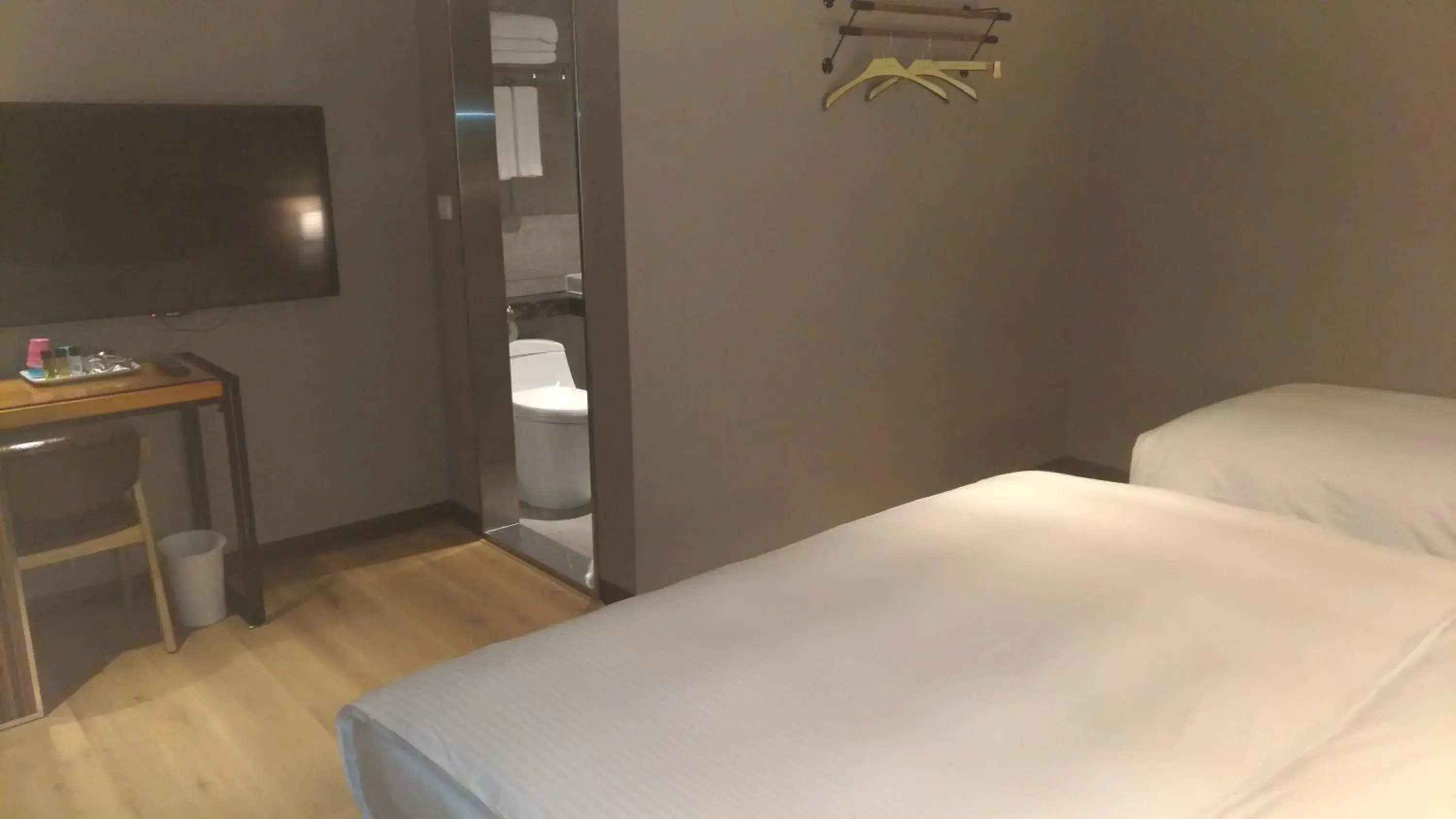 Bed in Lucky Apple Hotel Bed in Lucky Apple Hotel