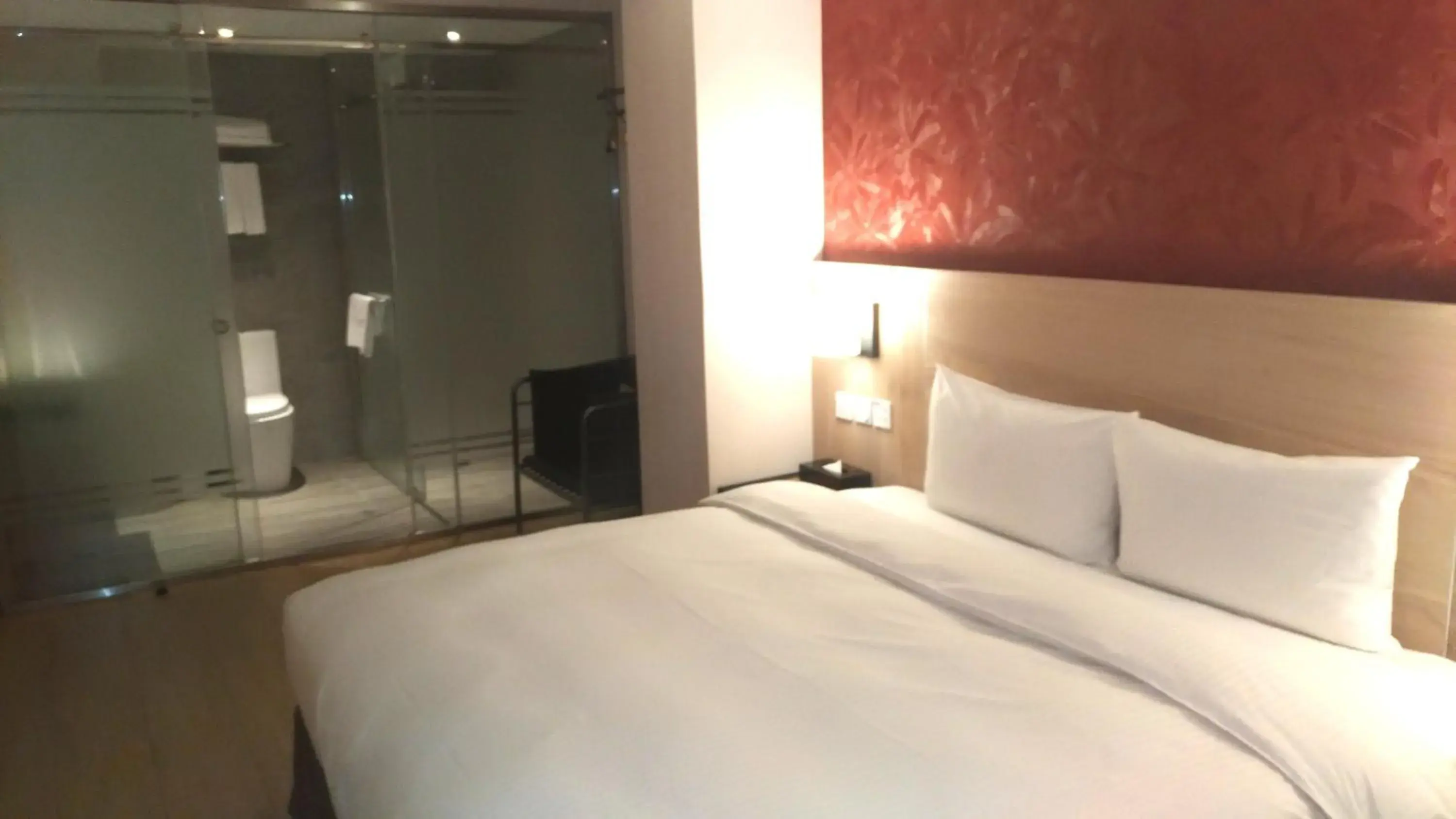 Bed in Lucky Apple Hotel Bed in Lucky Apple Hotel