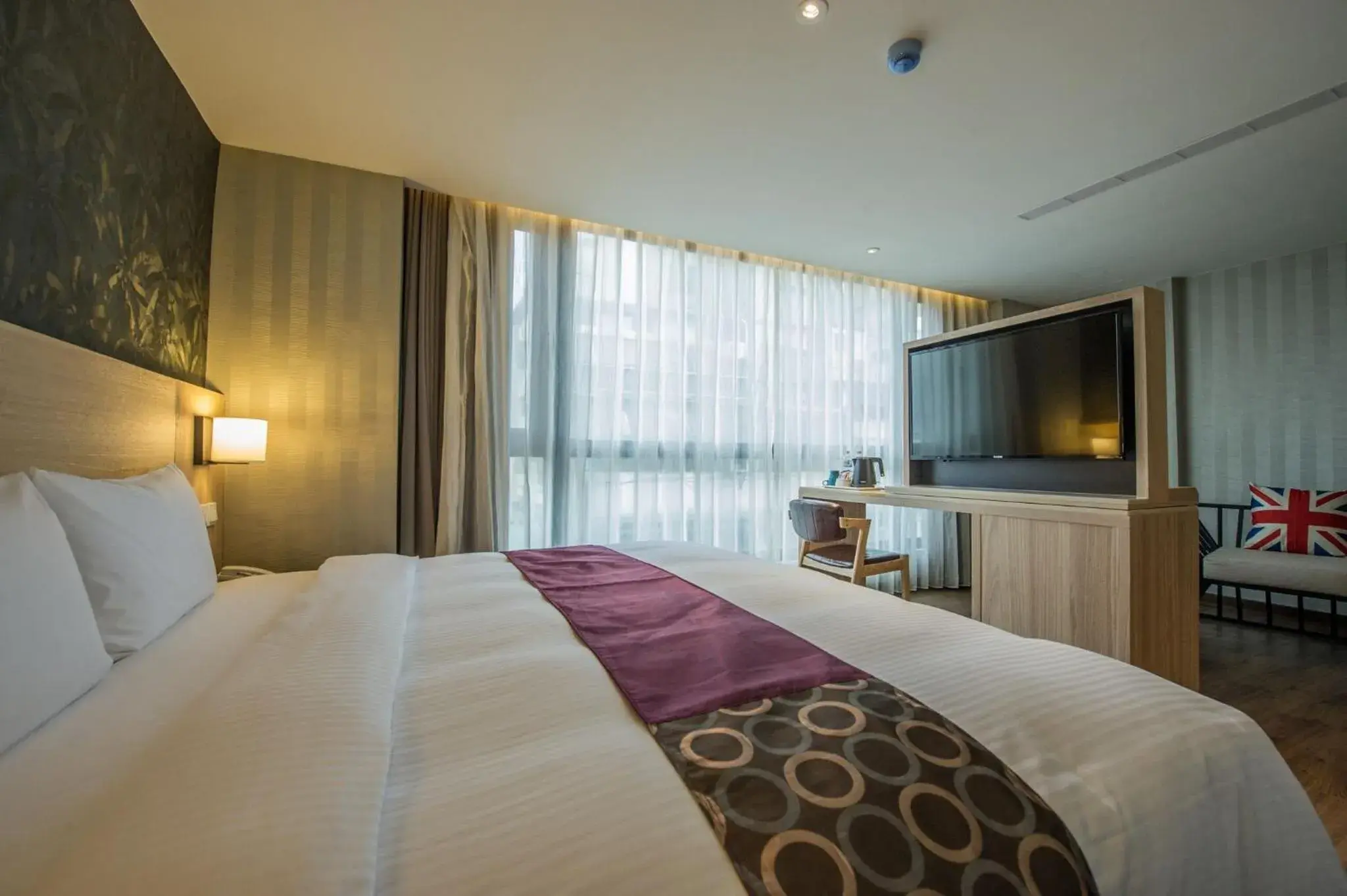 Bed in Lucky Apple Hotel Bed in Lucky Apple Hotel