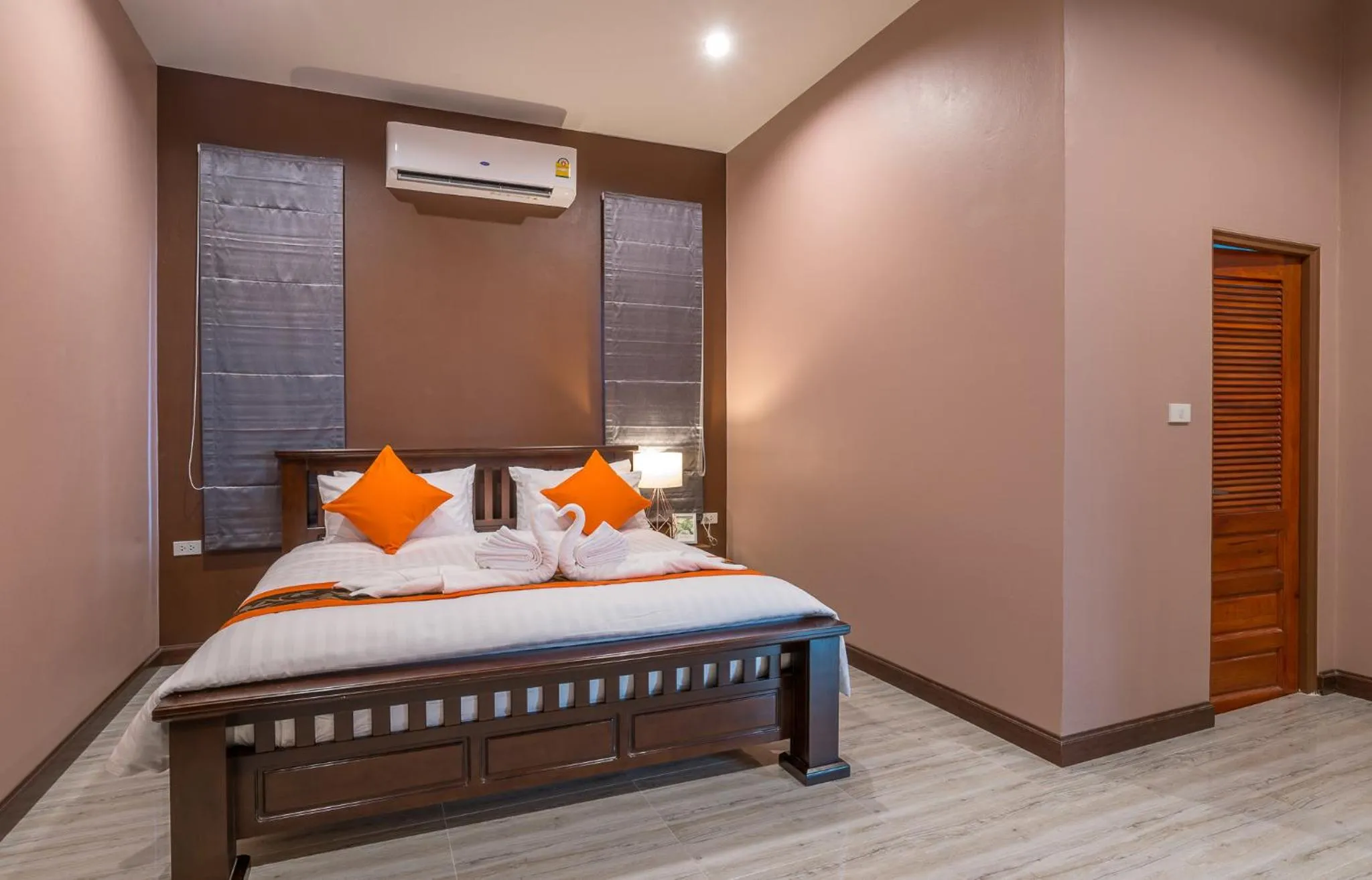 Bed in De Nathai Private Pool Villa