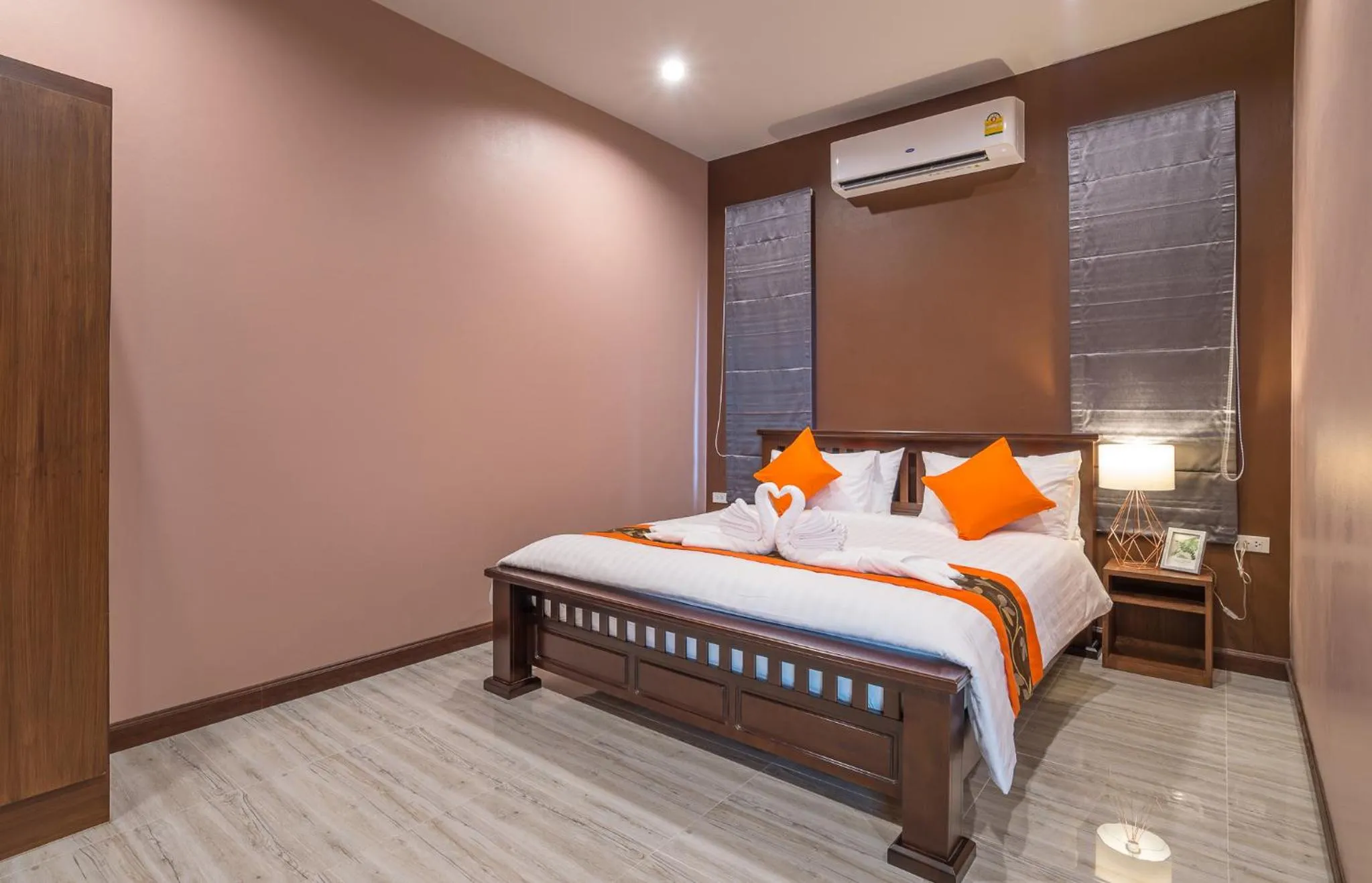 Bed in De Nathai Private Pool Villa