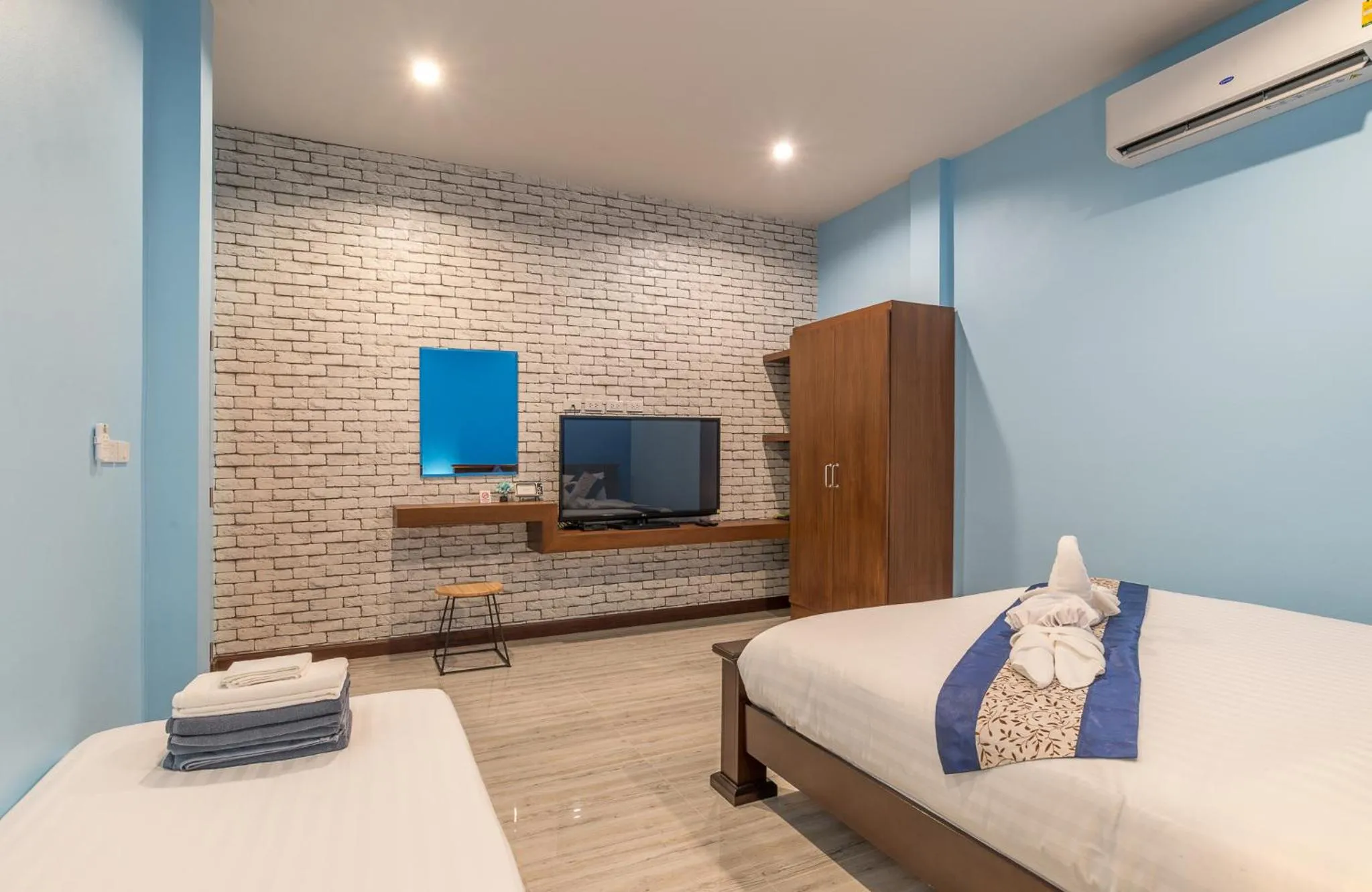 Bed in De Nathai Private Pool Villa