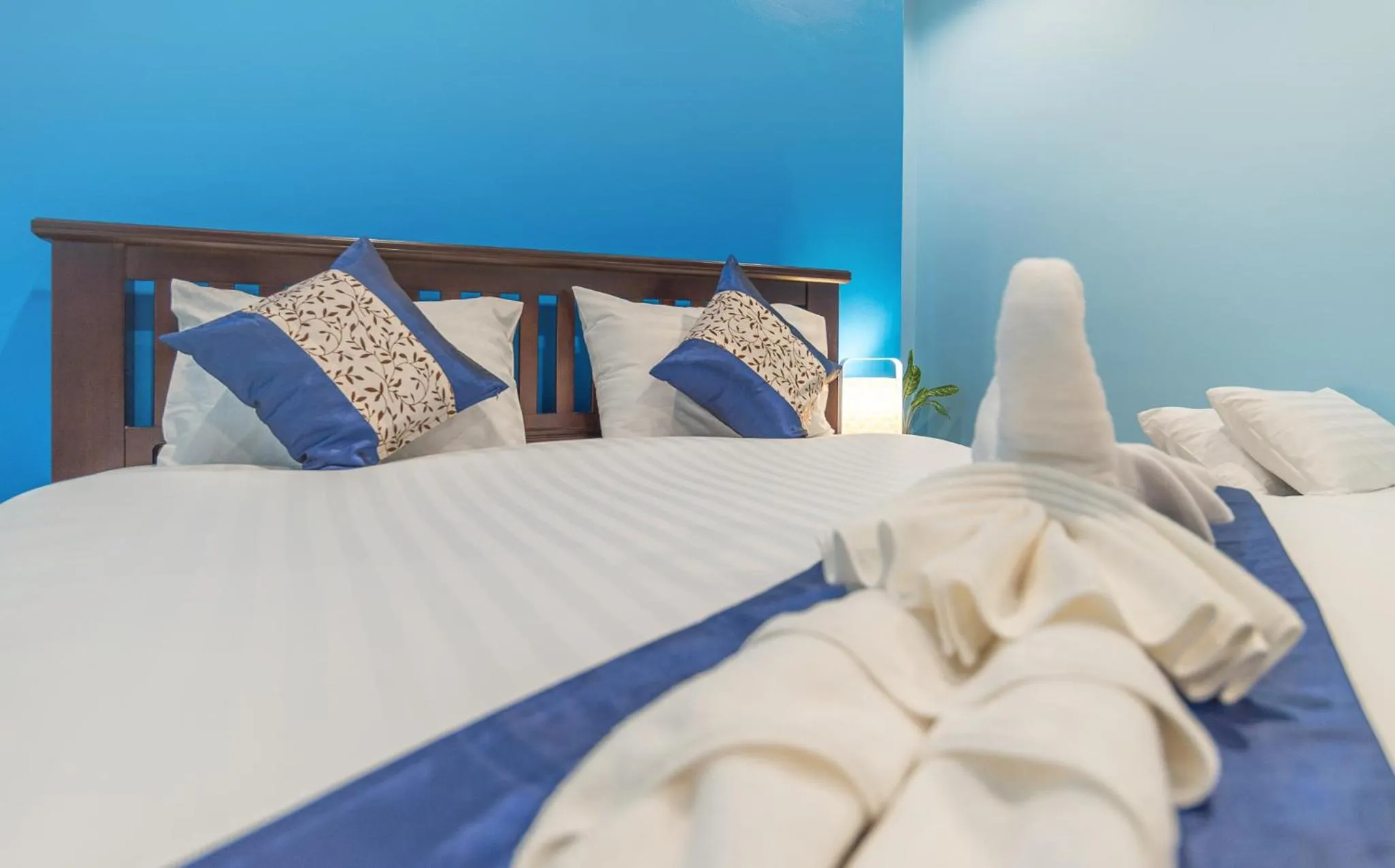 Bed in De Nathai Private Pool Villa