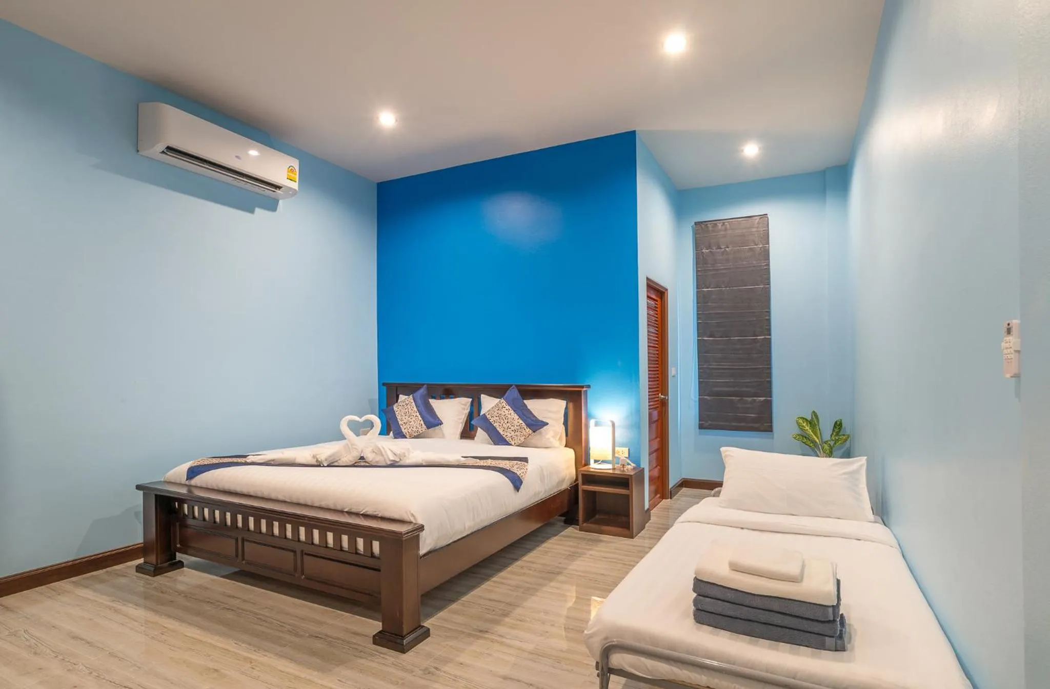 Bed in De Nathai Private Pool Villa
