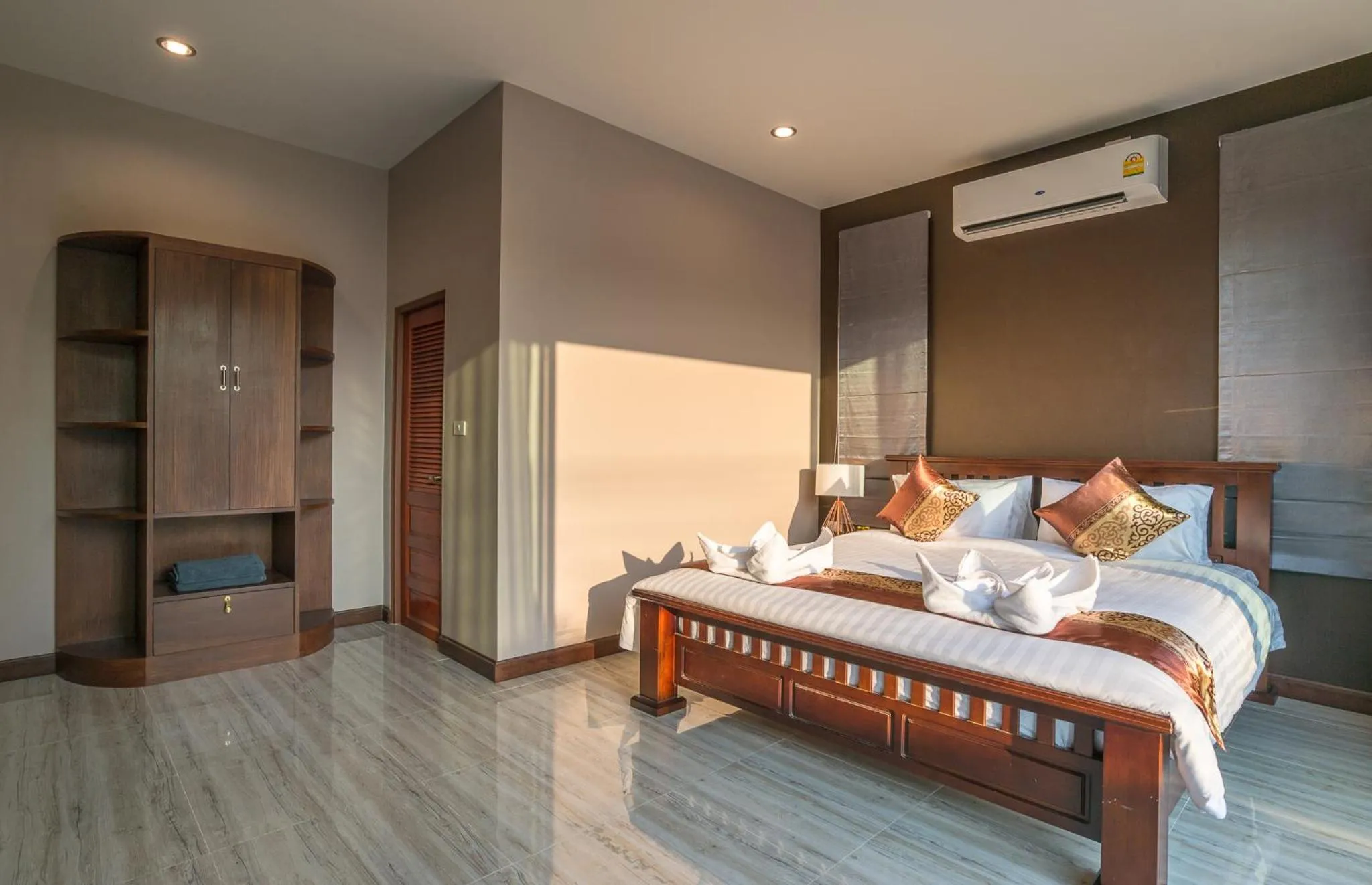 Bed in De Nathai Private Pool Villa