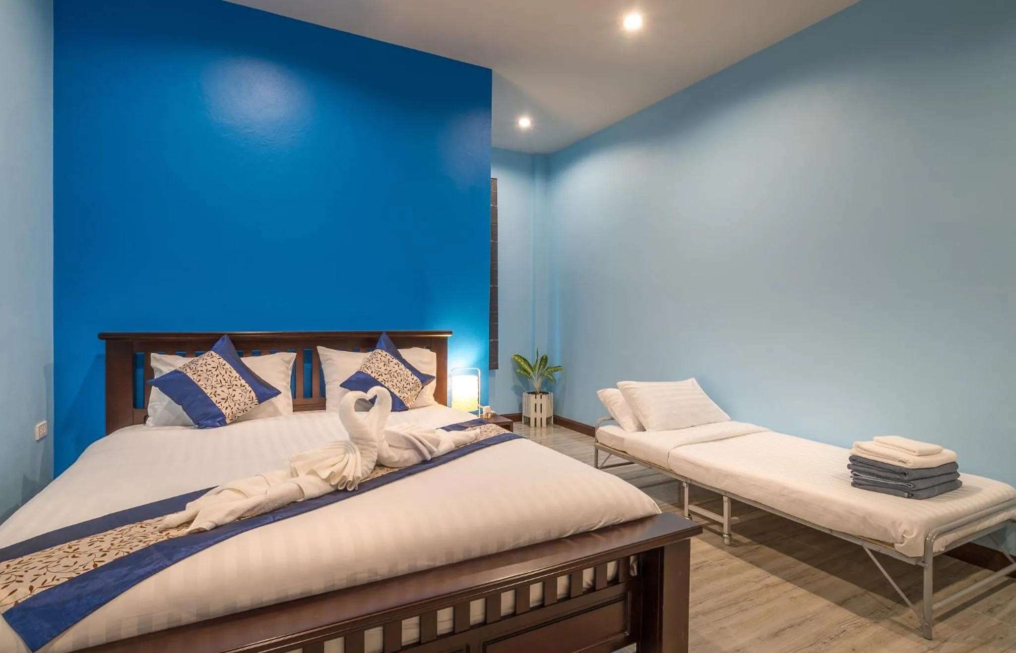 Bed in De Nathai Private Pool Villa