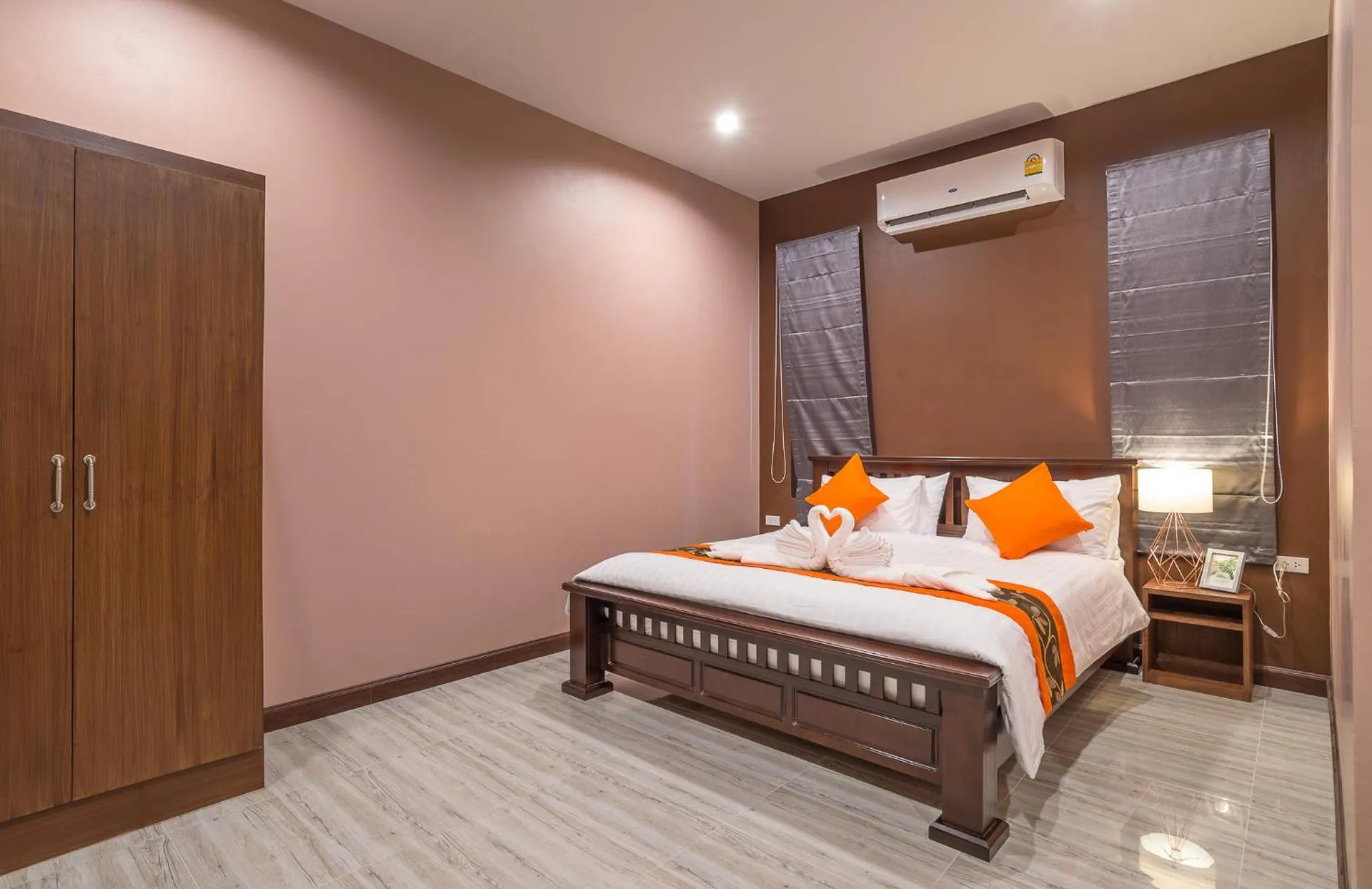 Bed in De Nathai Private Pool Villa