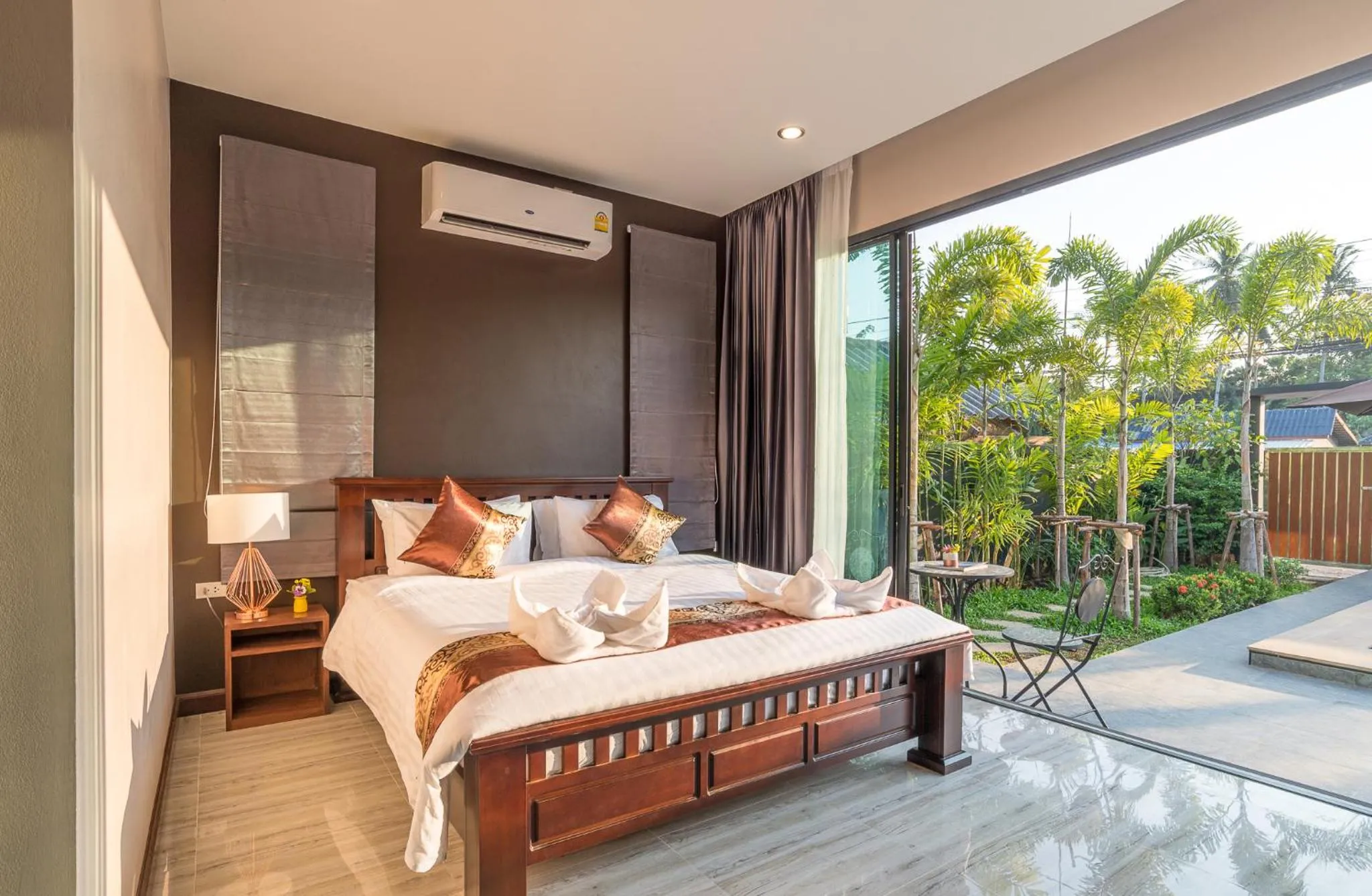 Bed in De Nathai Private Pool Villa