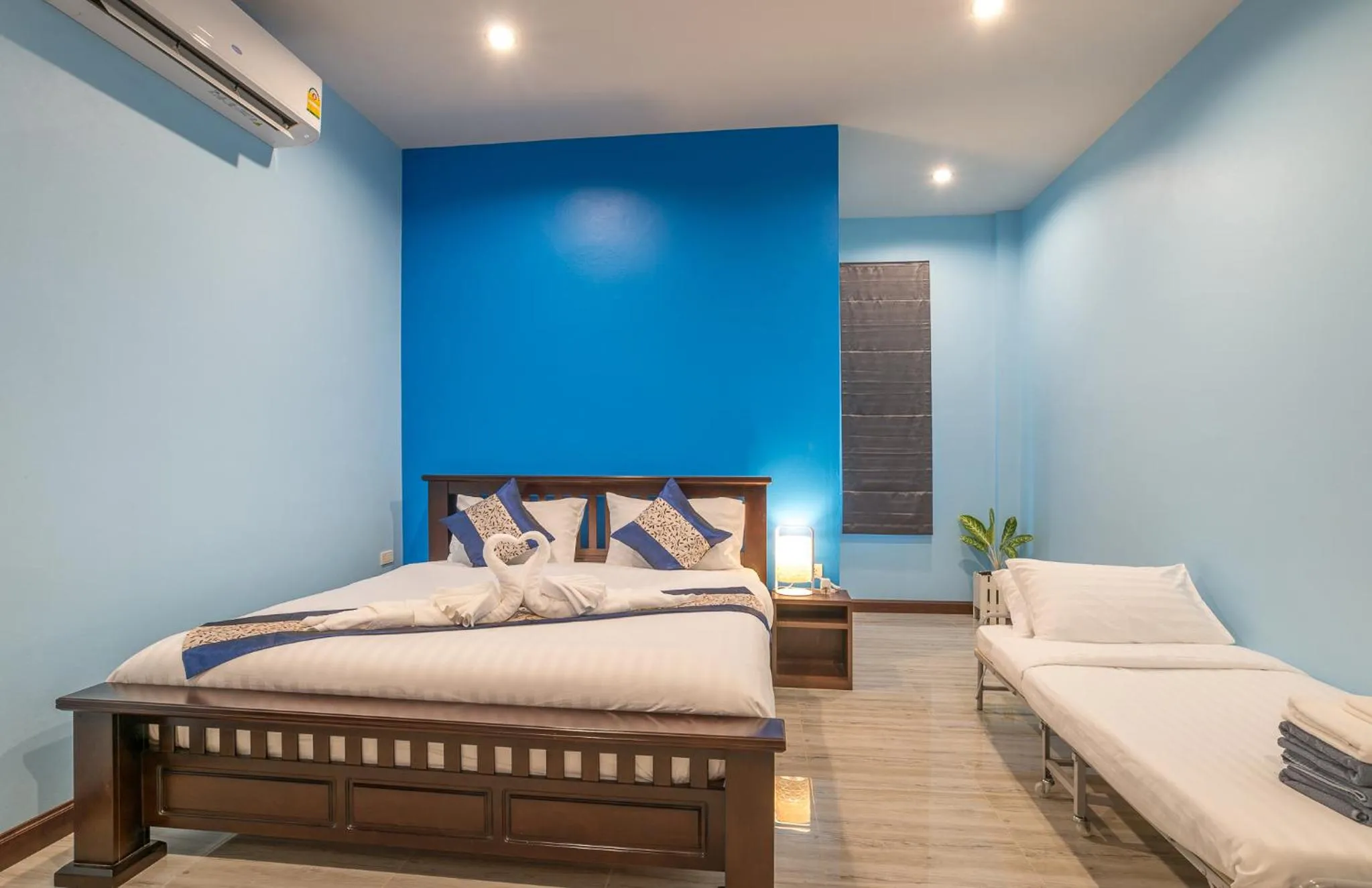 Bed in De Nathai Private Pool Villa