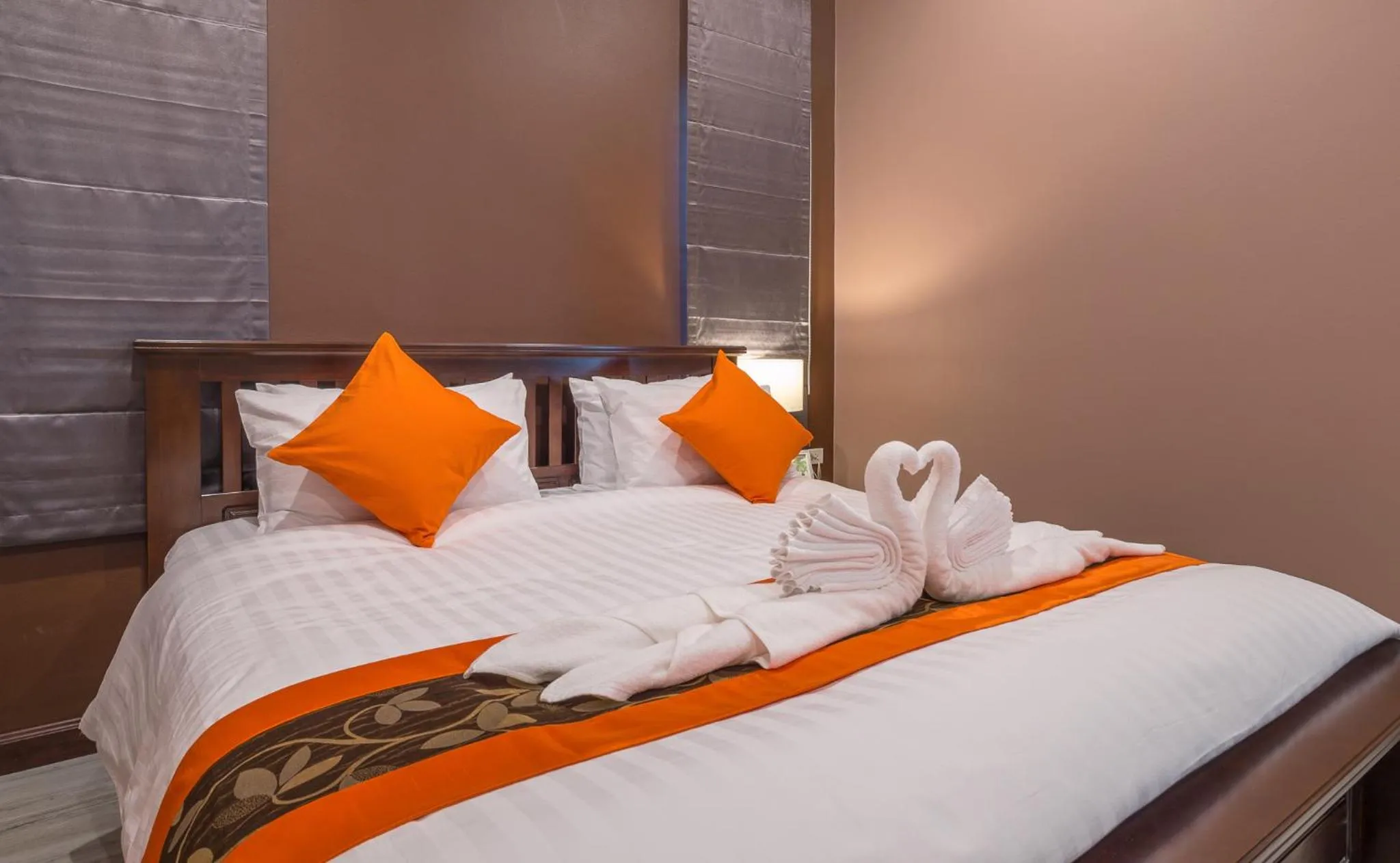 Bed in De Nathai Private Pool Villa