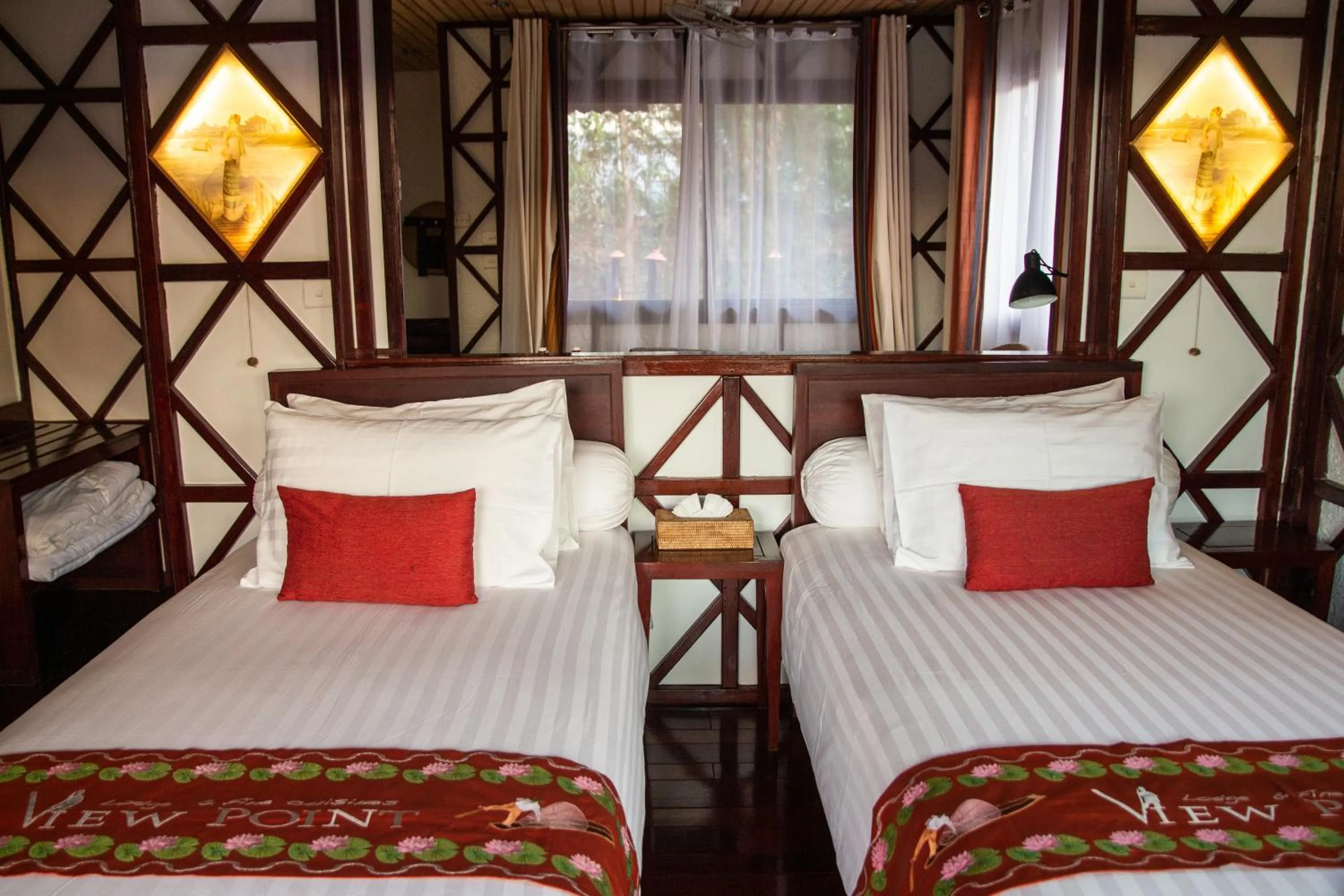 Bed in ViewPoint Ecolodge