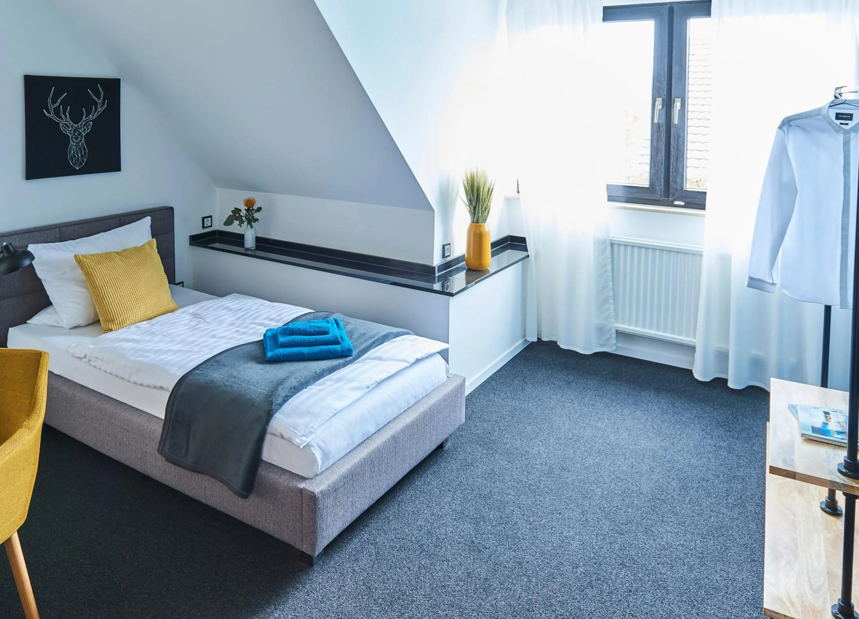 Photo of the whole room, Bed in SCHLAFGUT! HOTEL-WILL.ICH Garni