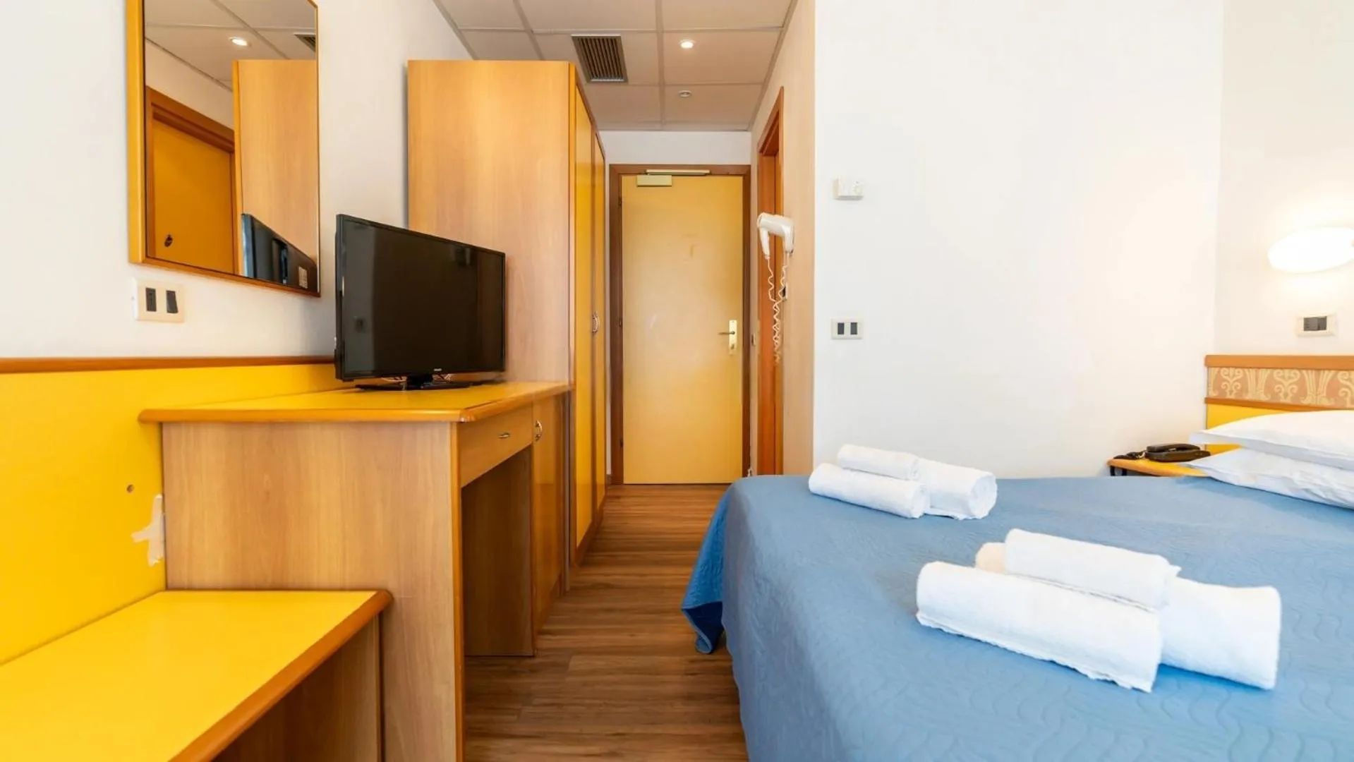 Bed in Hotel Cosmopol Cesenatico