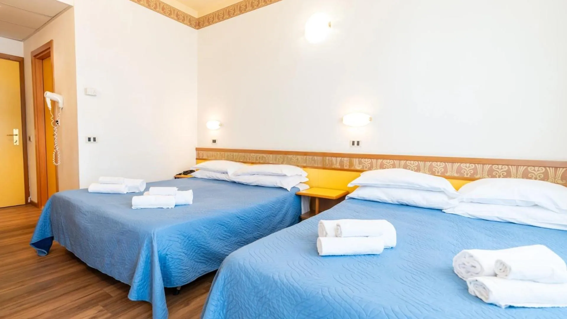 Bed in Hotel Cosmopol Cesenatico