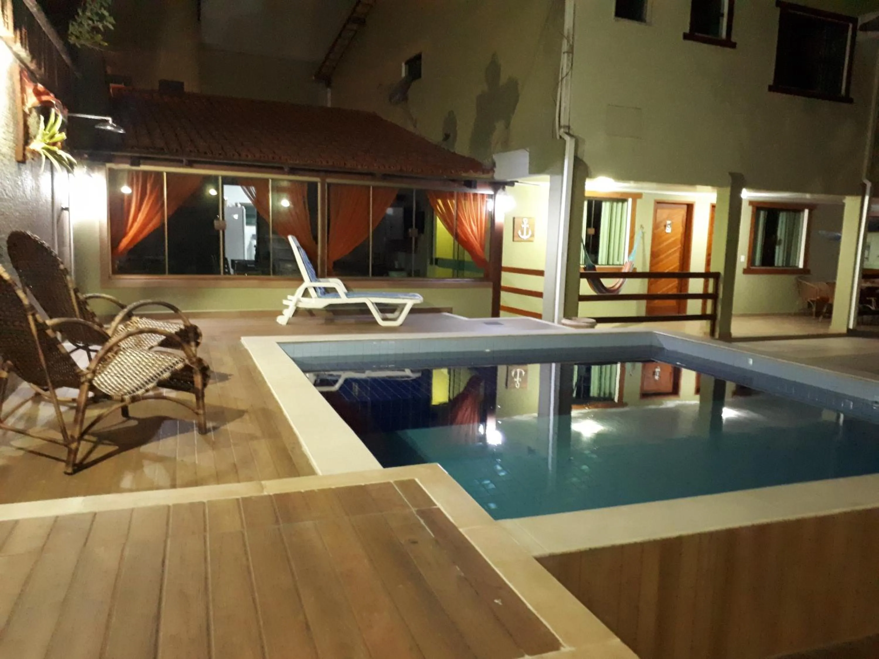Swimming pool in Pousada Encantos do Peró