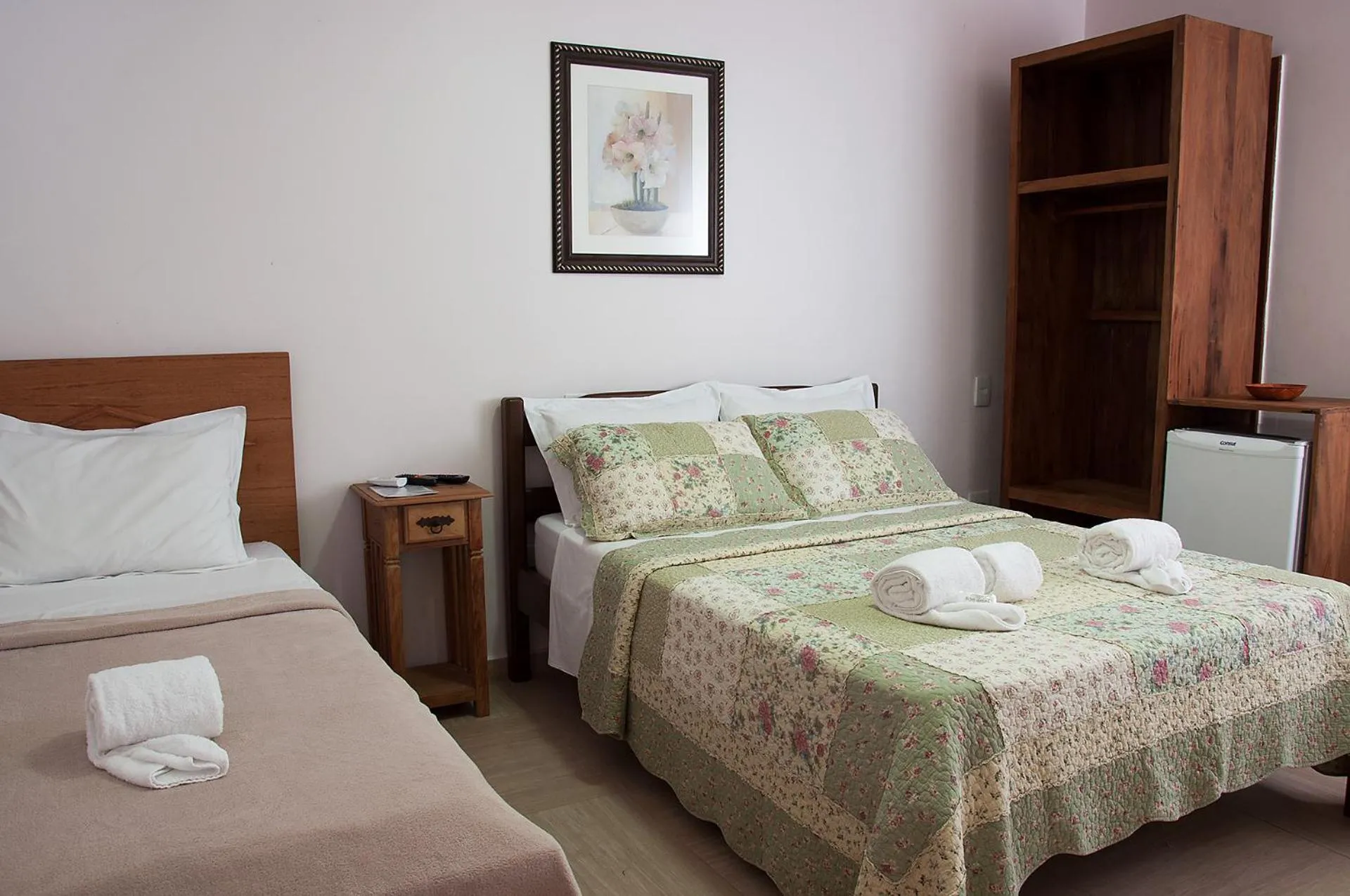 Bed in Pousada Encantos do Peró
