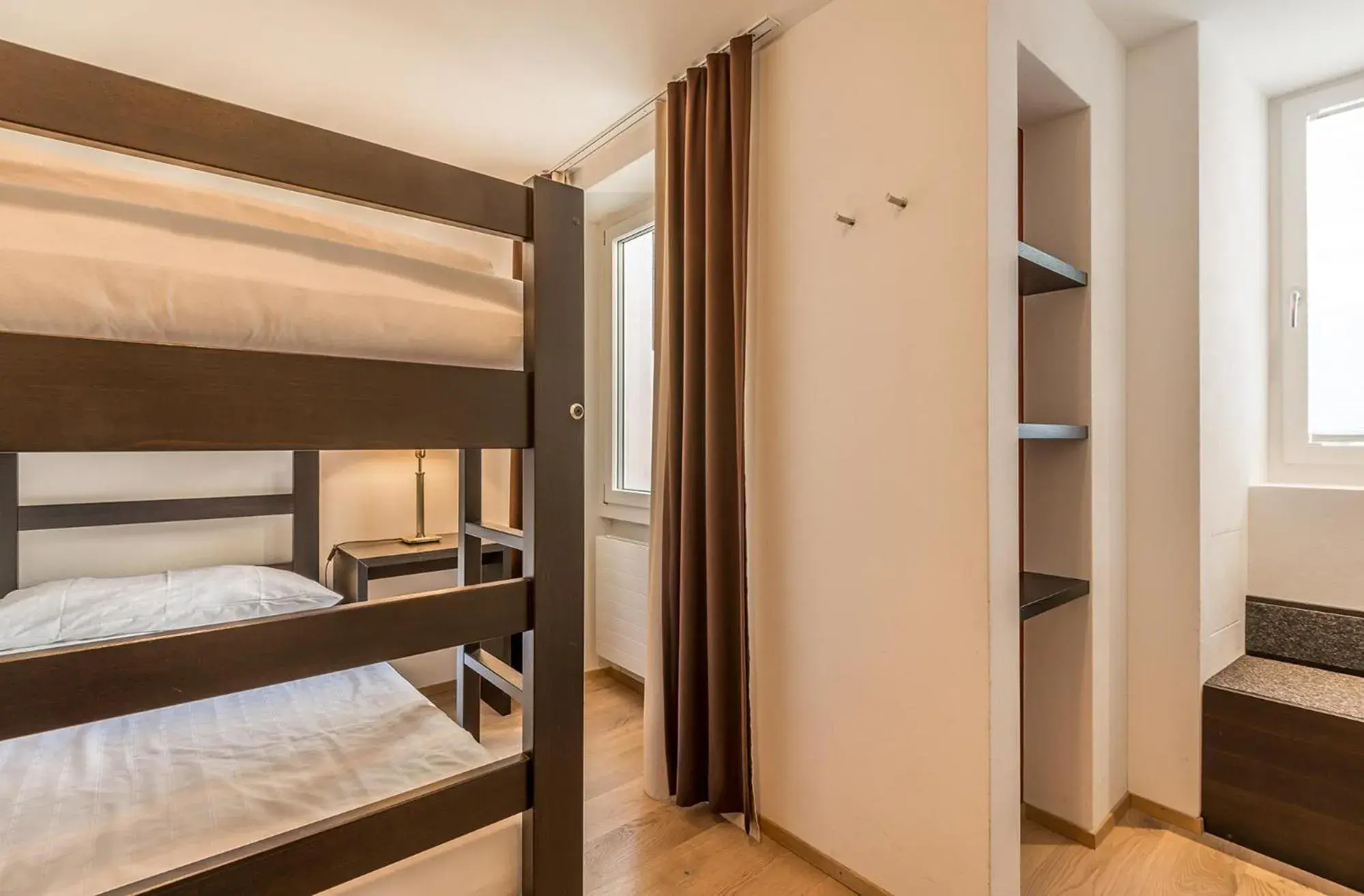 Photo of the whole room, Bed in Hotel Alpina Luzern Photo of the whole room, Bed in Hotel Alpina Luzern