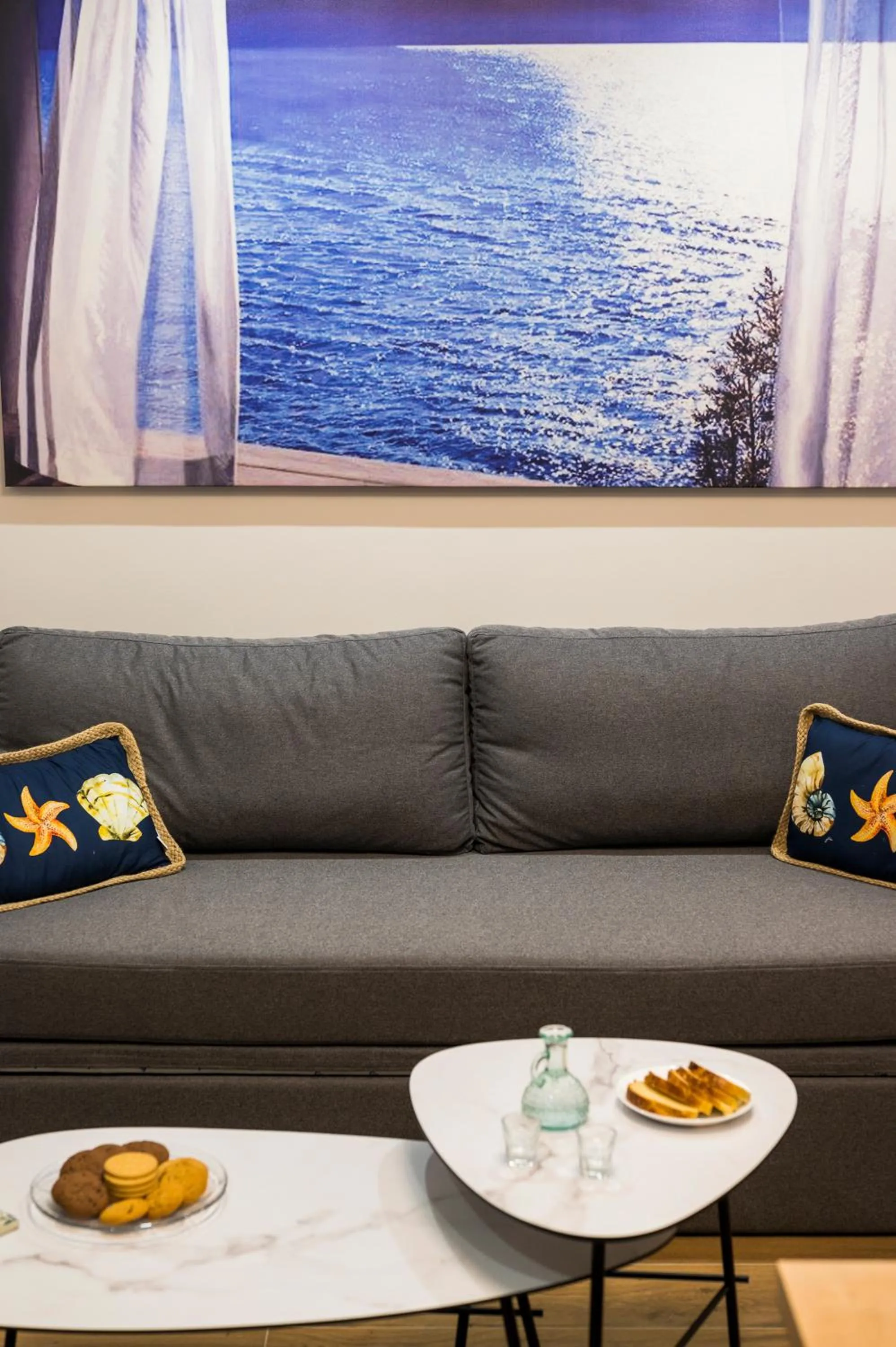 Seating area in Aequor Luxury Rooms & Apartments