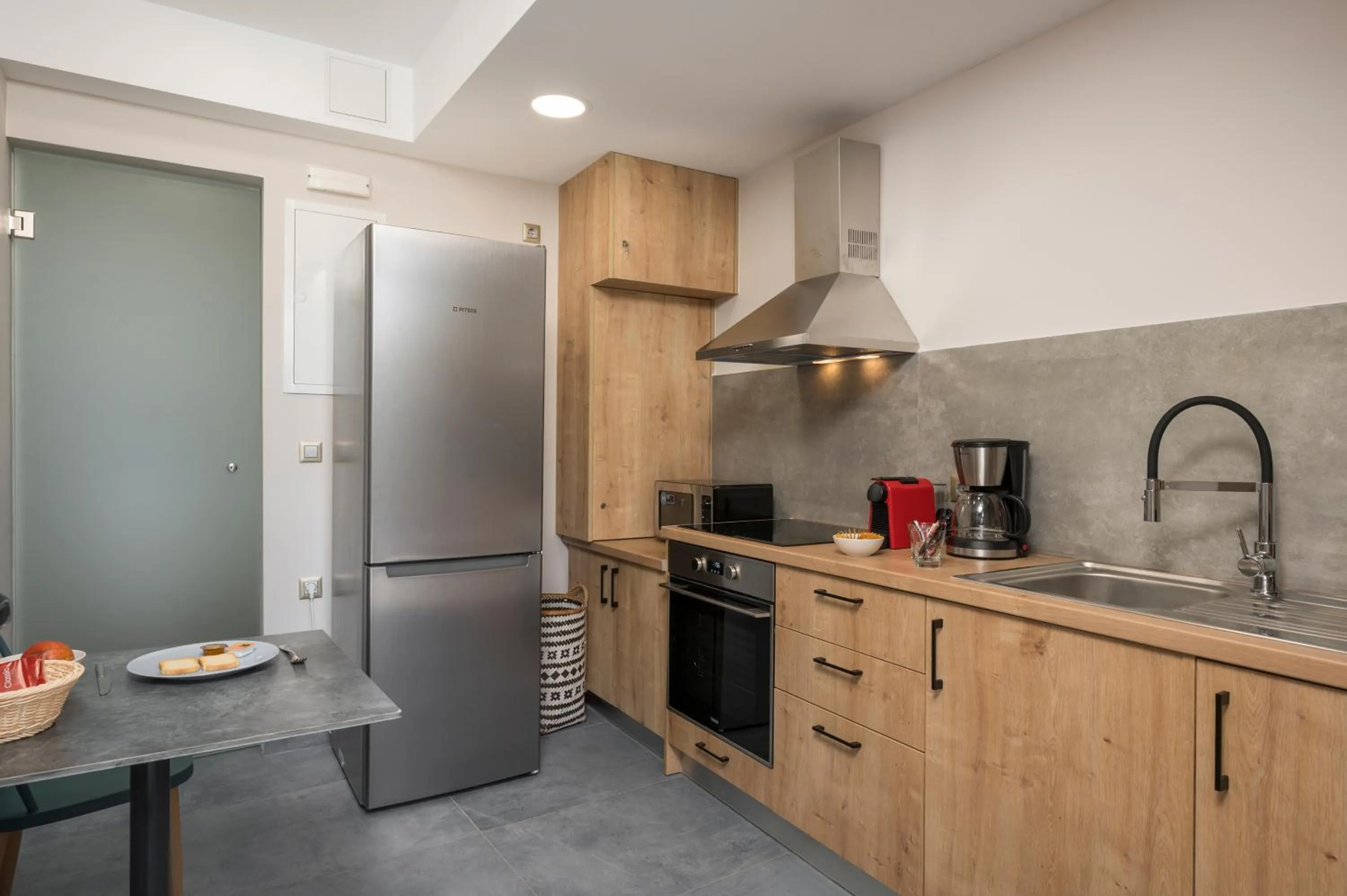 Kitchen or kitchenette in Aequor Luxury Rooms & Apartments