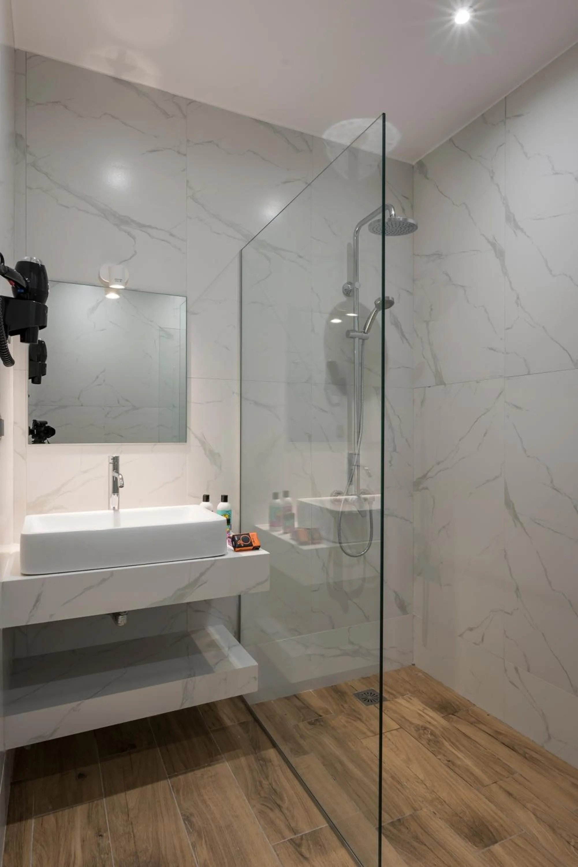 Shower in Aequor Luxury Rooms & Apartments