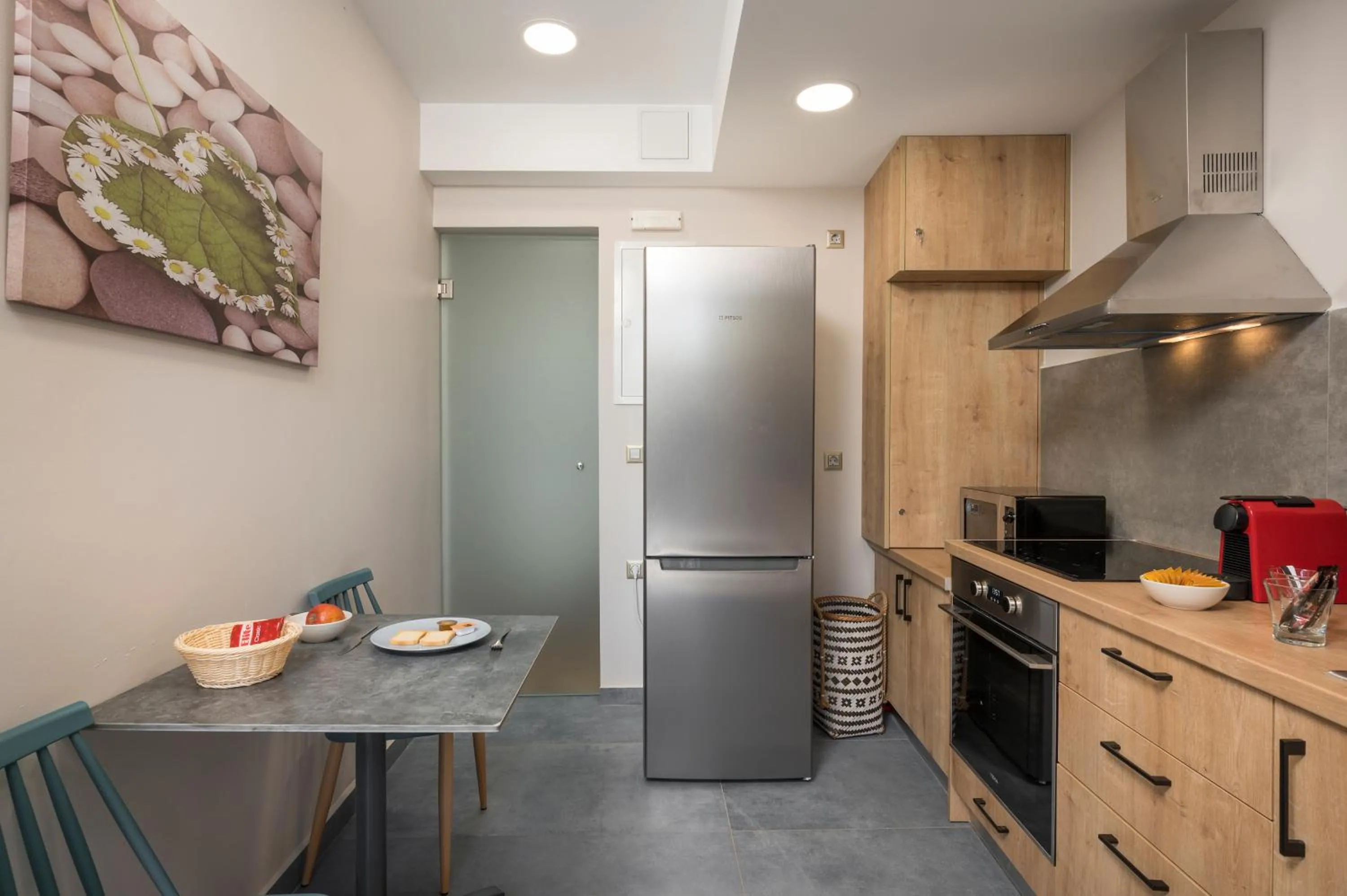 Kitchen or kitchenette in Aequor Luxury Rooms & Apartments