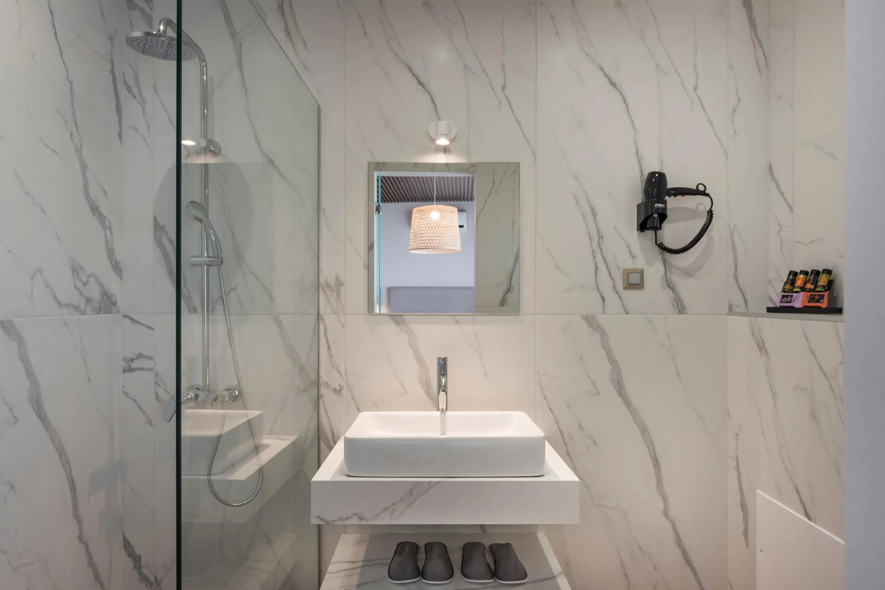 Shower in Aequor Luxury Rooms & Apartments