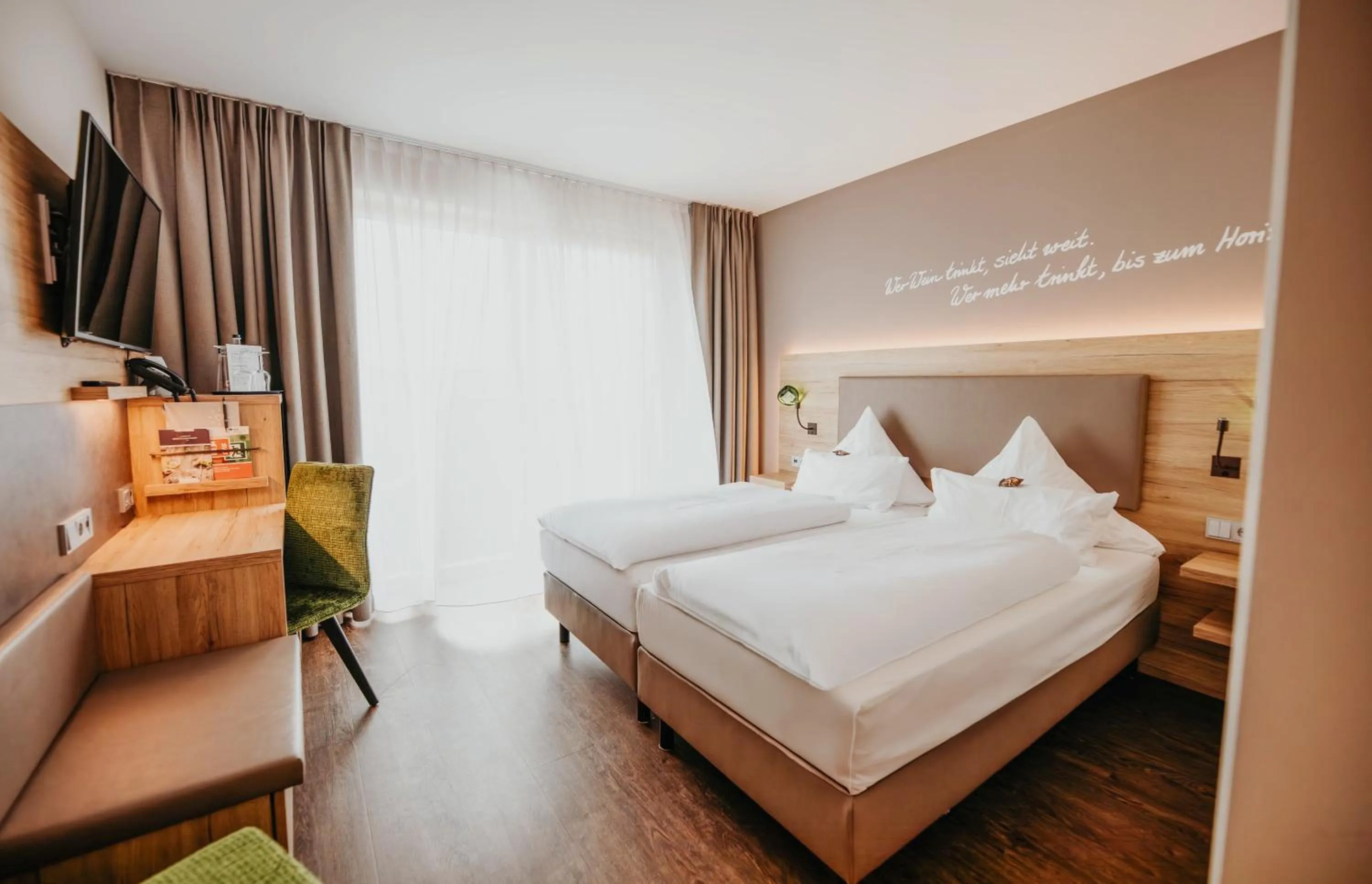 Bedroom, Bed in Sonnenhotel Weingut Römmert Spa und Wellness