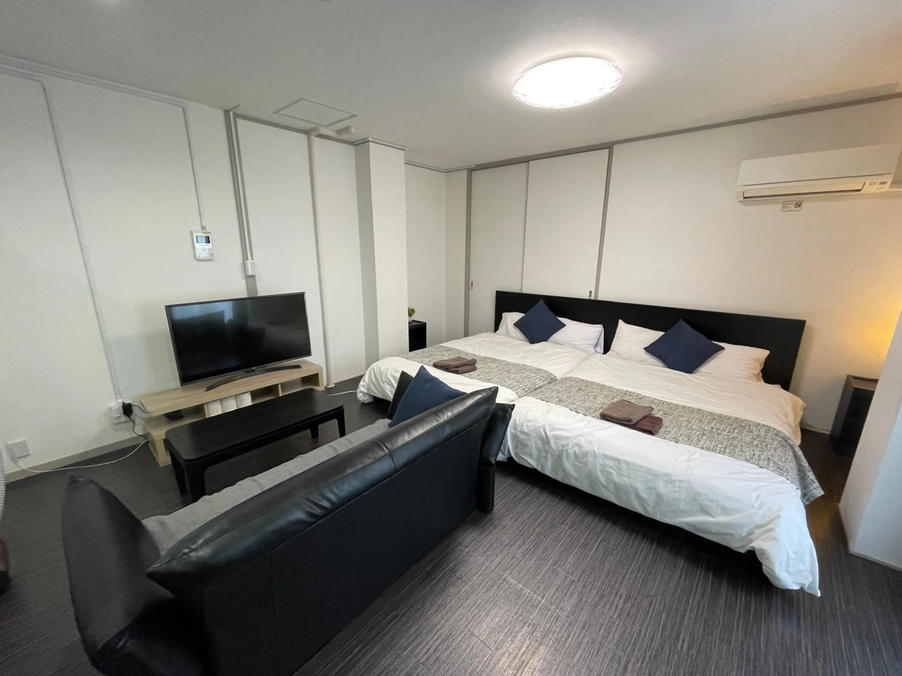 Bed in Fuji Heights Hotel