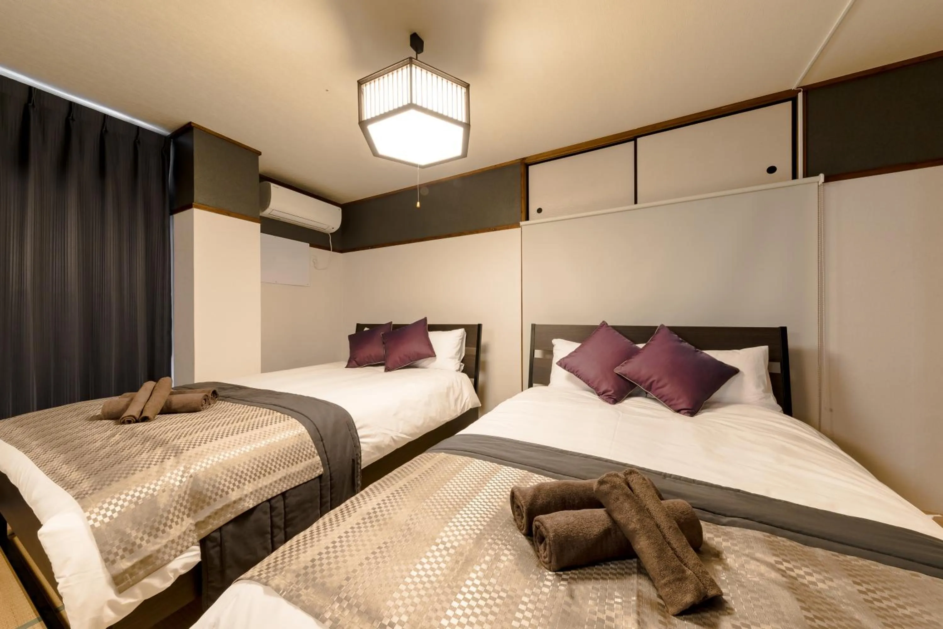 Bed in Fuji Heights Hotel