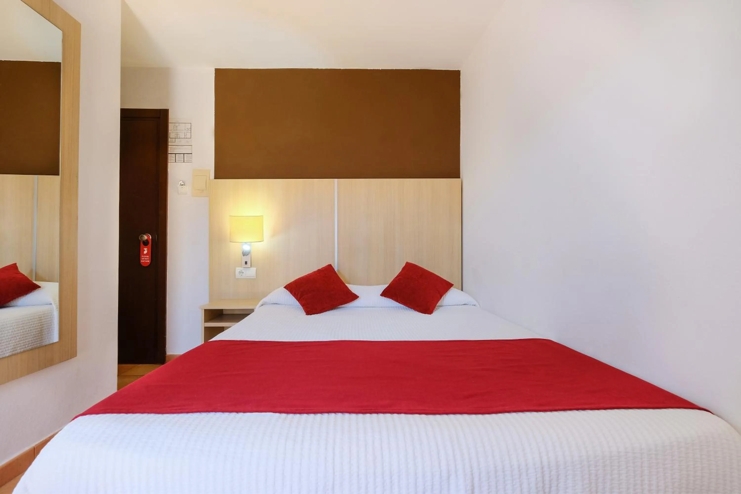 Decorative detail, Bed in azuLine Hostal Marino