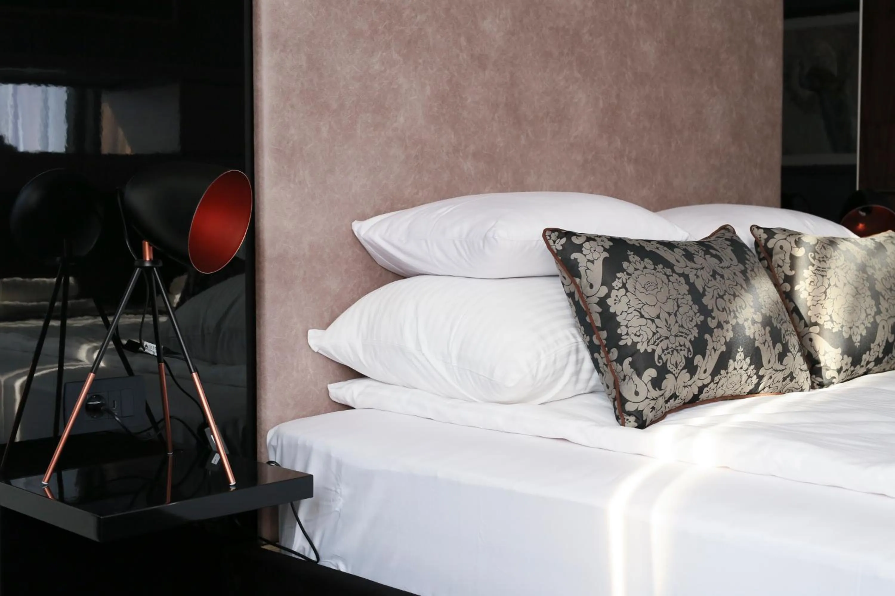 Bed in Carpe Diem Boutique Hotel