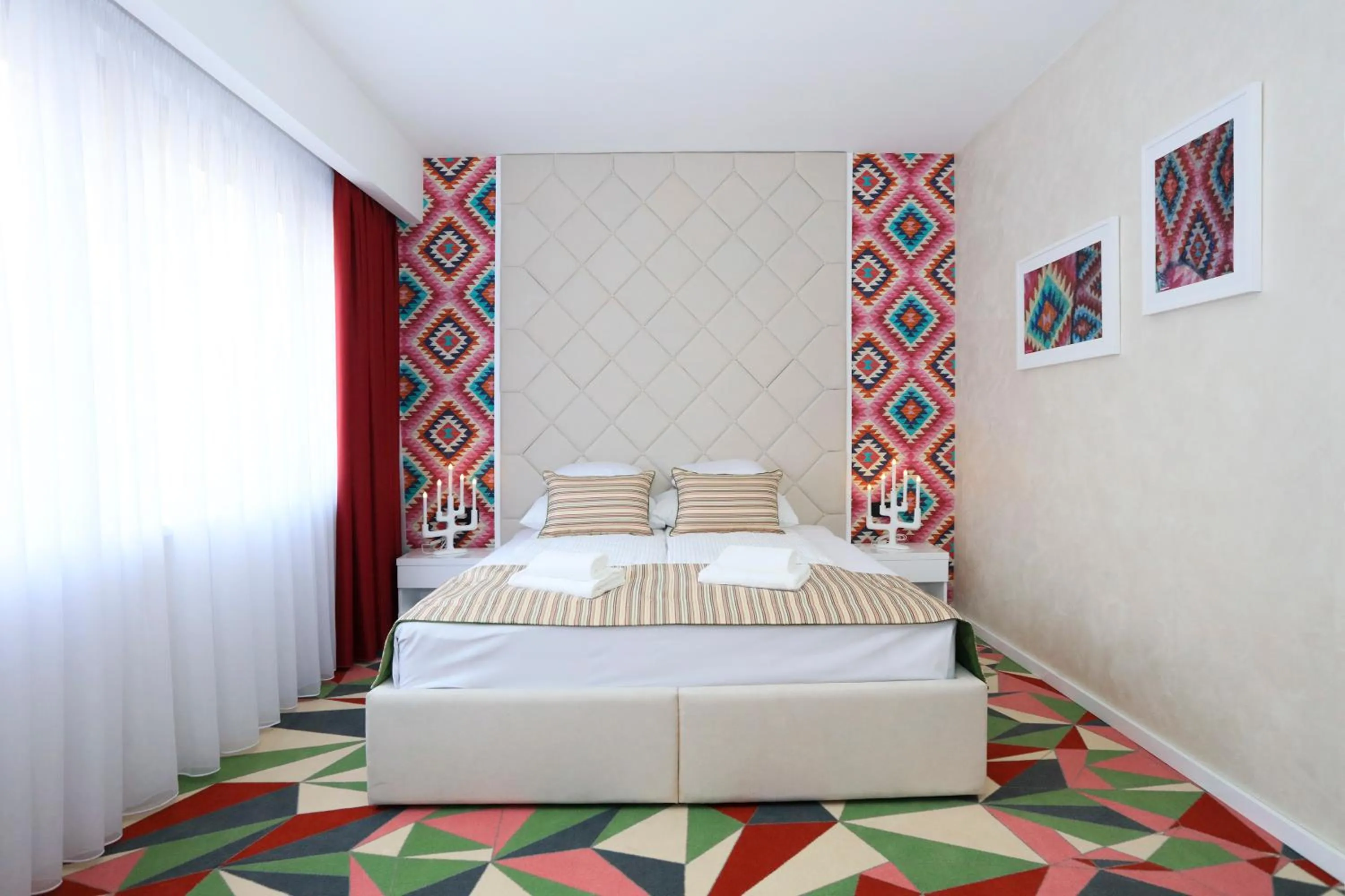 Bed in Carpe Diem Boutique Hotel