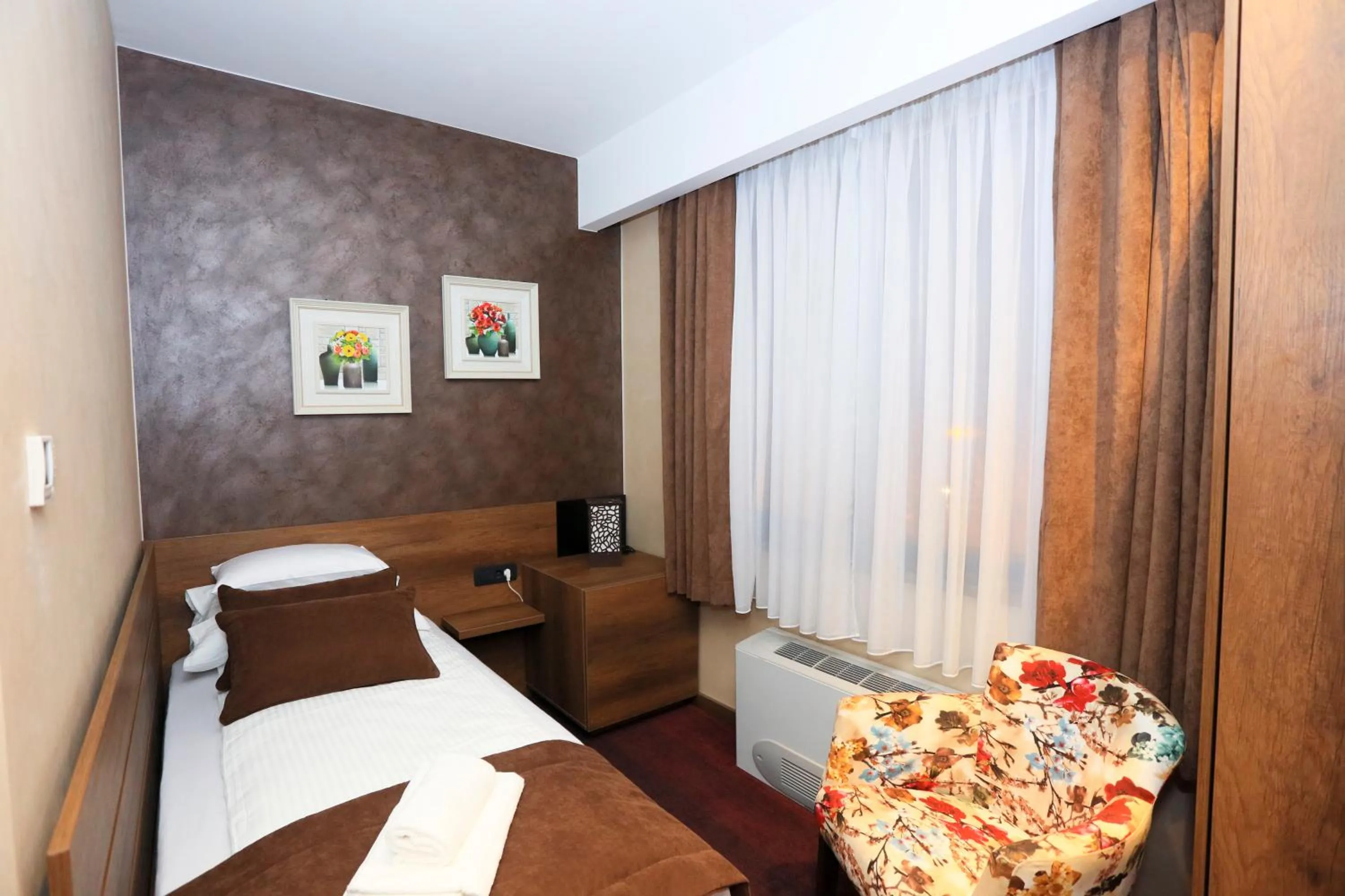 Bed in Carpe Diem Boutique Hotel