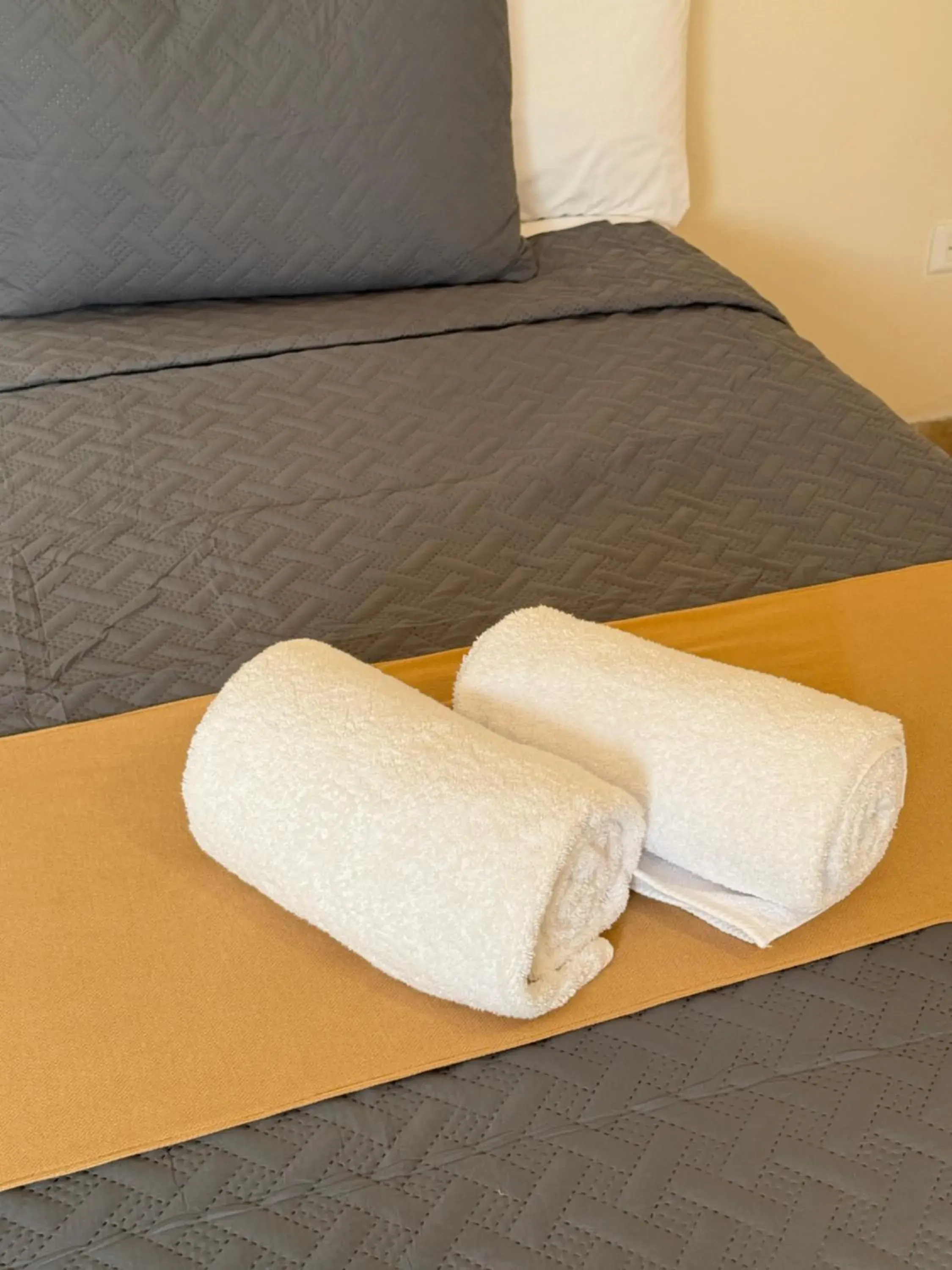 towels, Bed in Luciana Hotel & Beach Club towels, Bed in Luciana Hotel & Beach Club