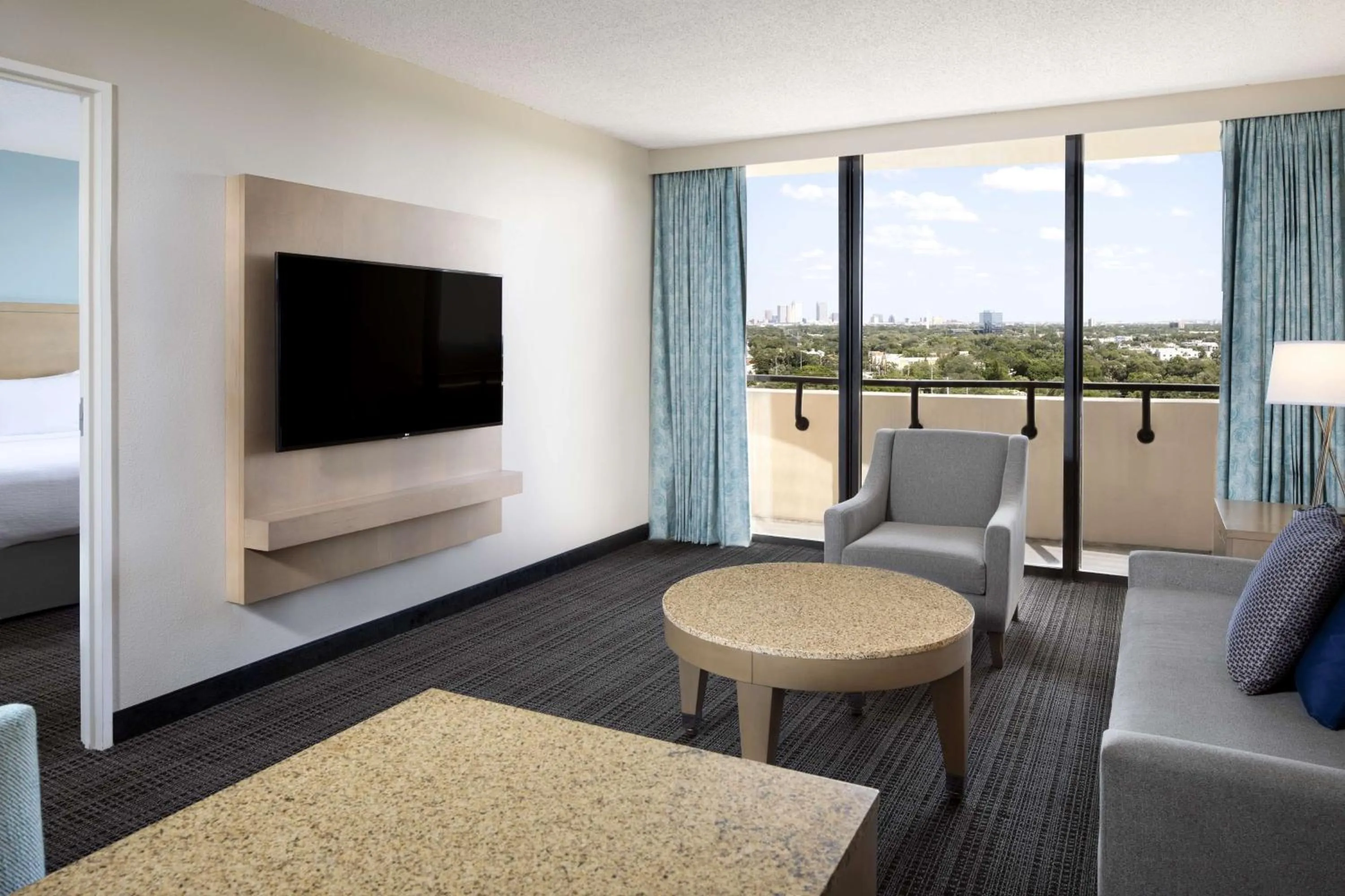 Living room, Bed in Embassy Suites by Hilton Tampa Airport Westshore