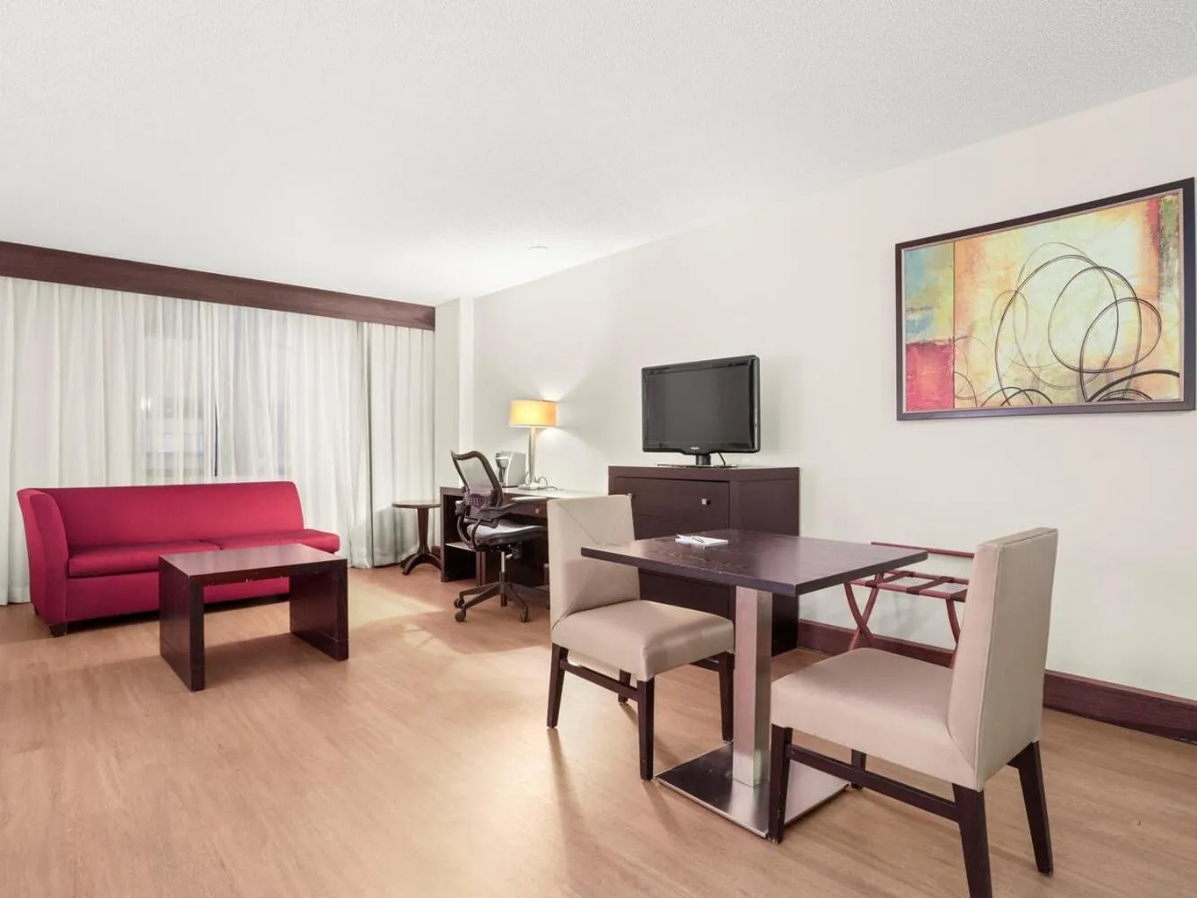 Communal lounge/ TV room in The Armon Stamford Hotel & Conference Center