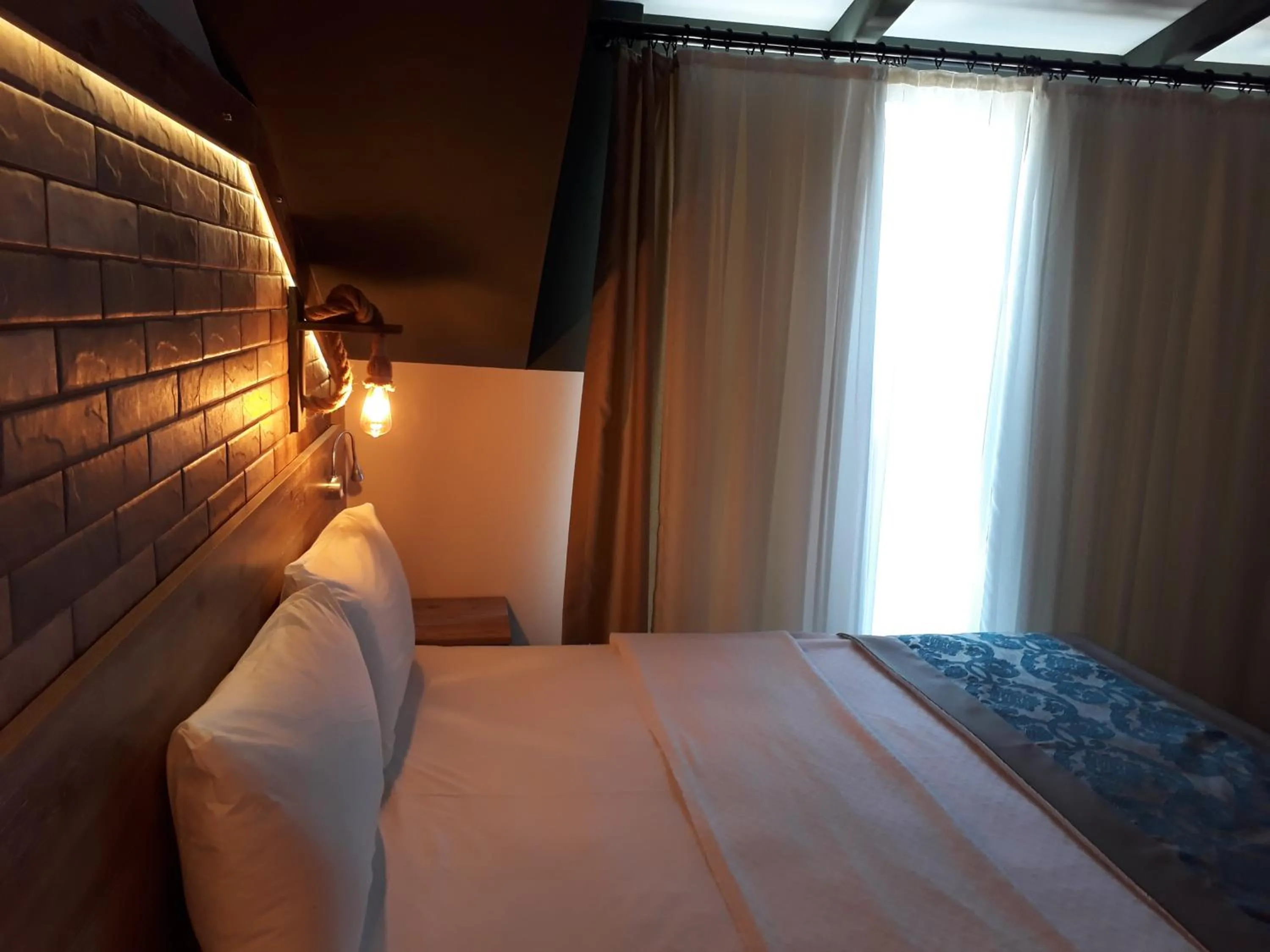 Bed in THE SARIGERME INN