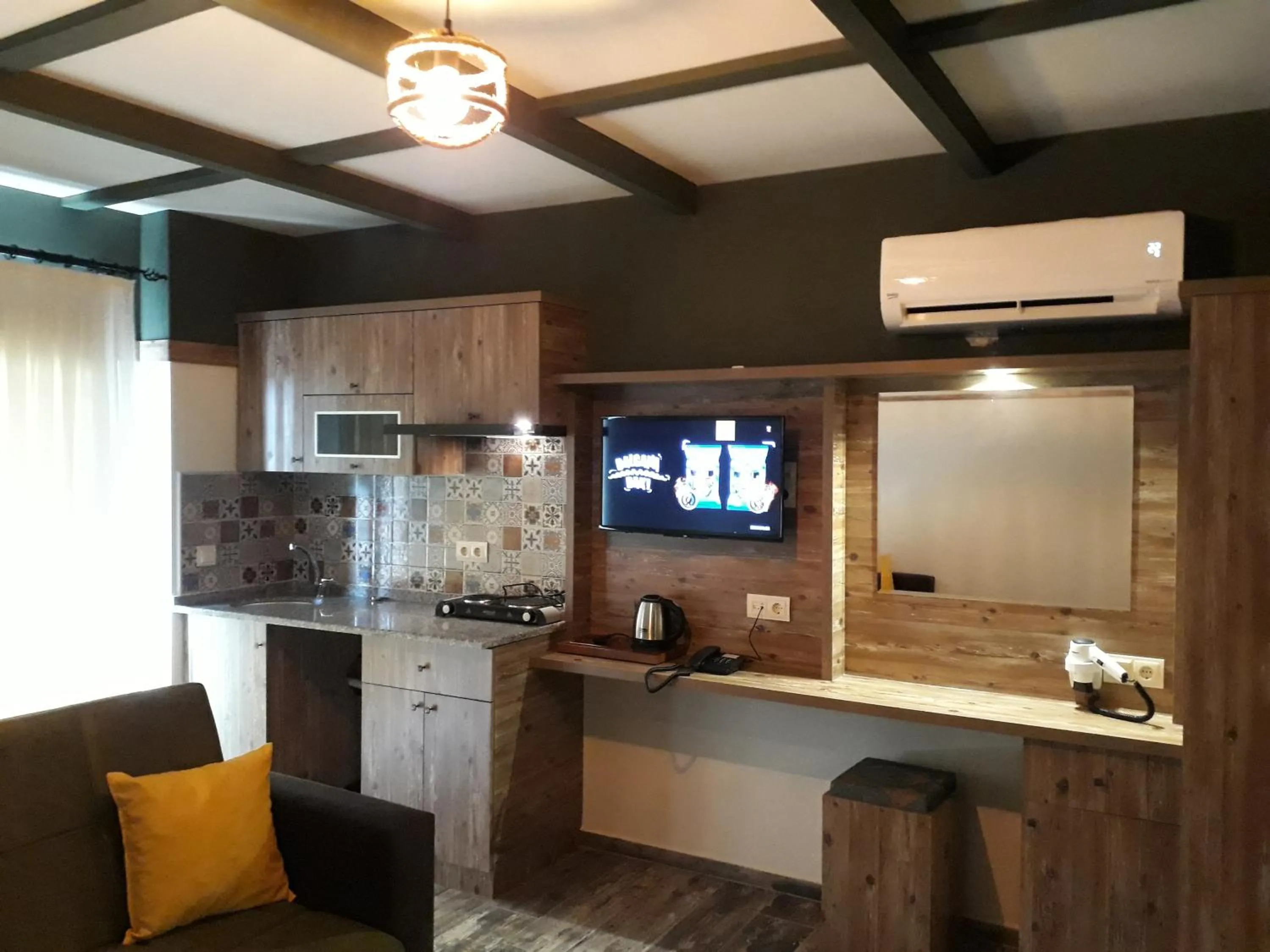 Kitchen or kitchenette in THE SARIGERME INN