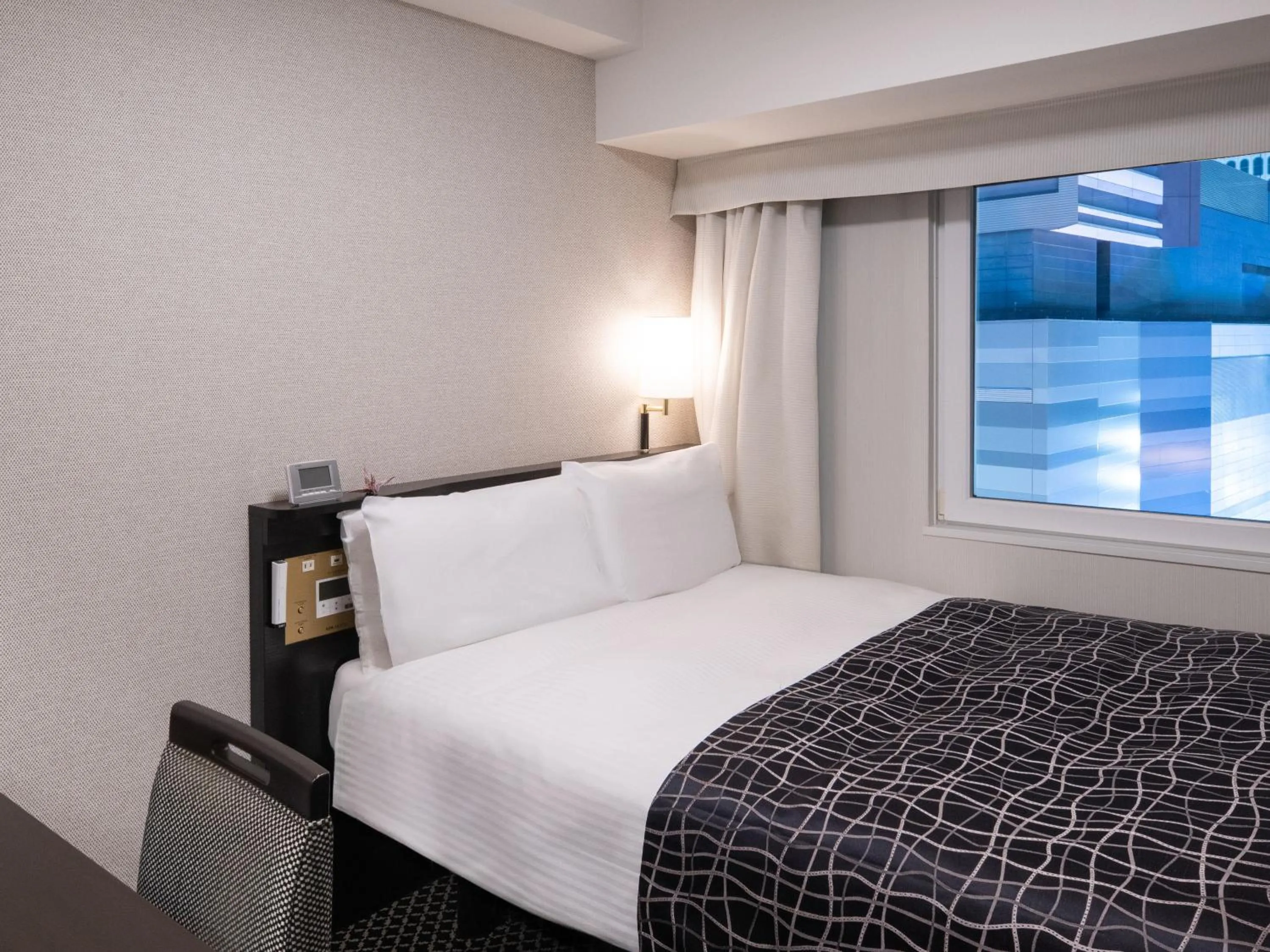 Bed in APA Hotel Shinjuku Kabukicho Chuo