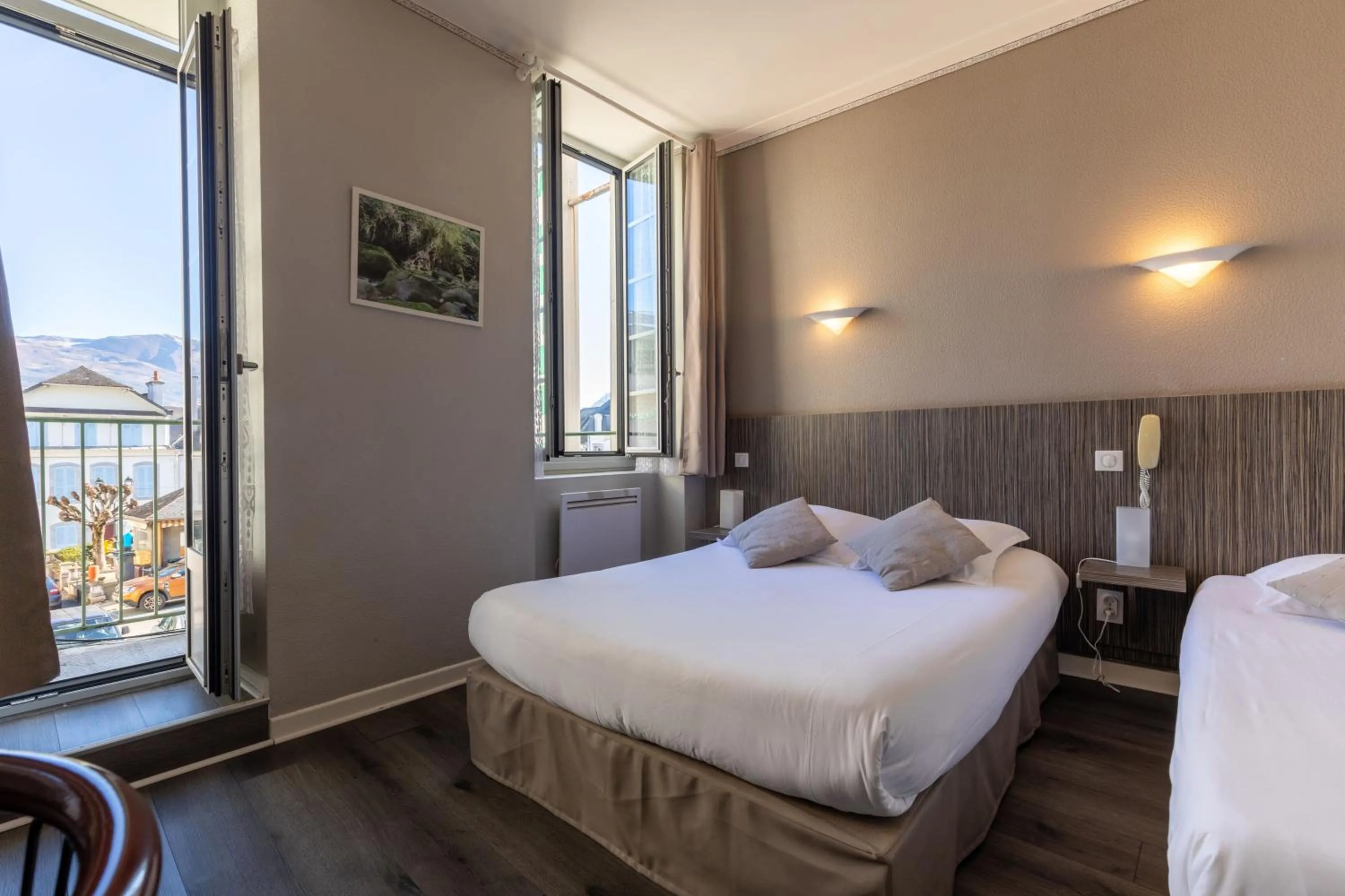 Bed in Hôtel Café les Fleurs