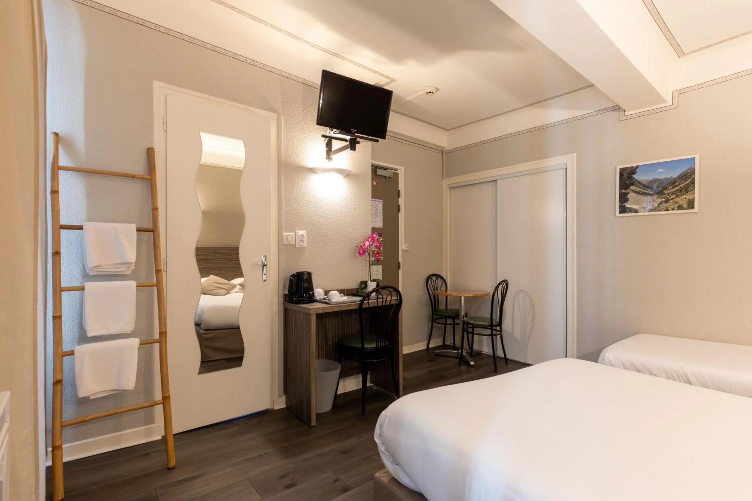 Bed in Hôtel Café les Fleurs