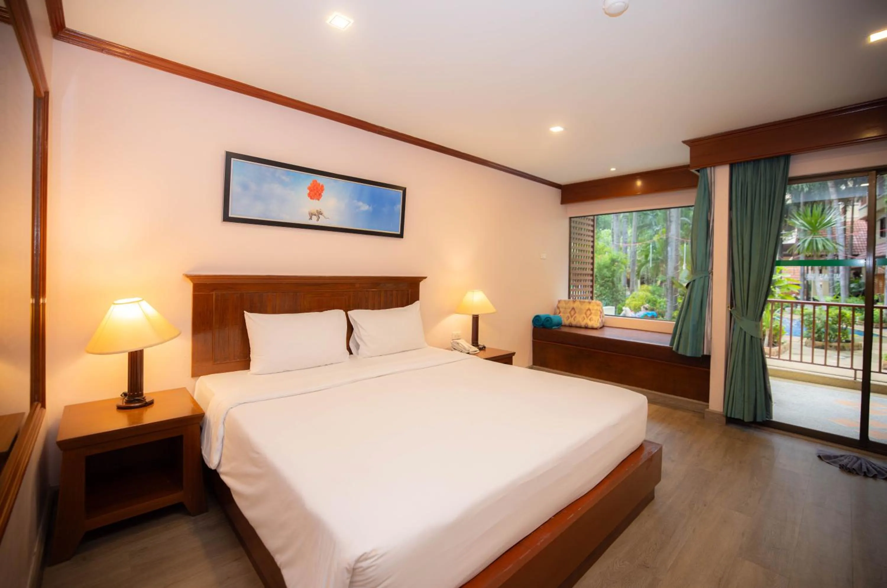 Bed in Baumanburi Hotel Patong