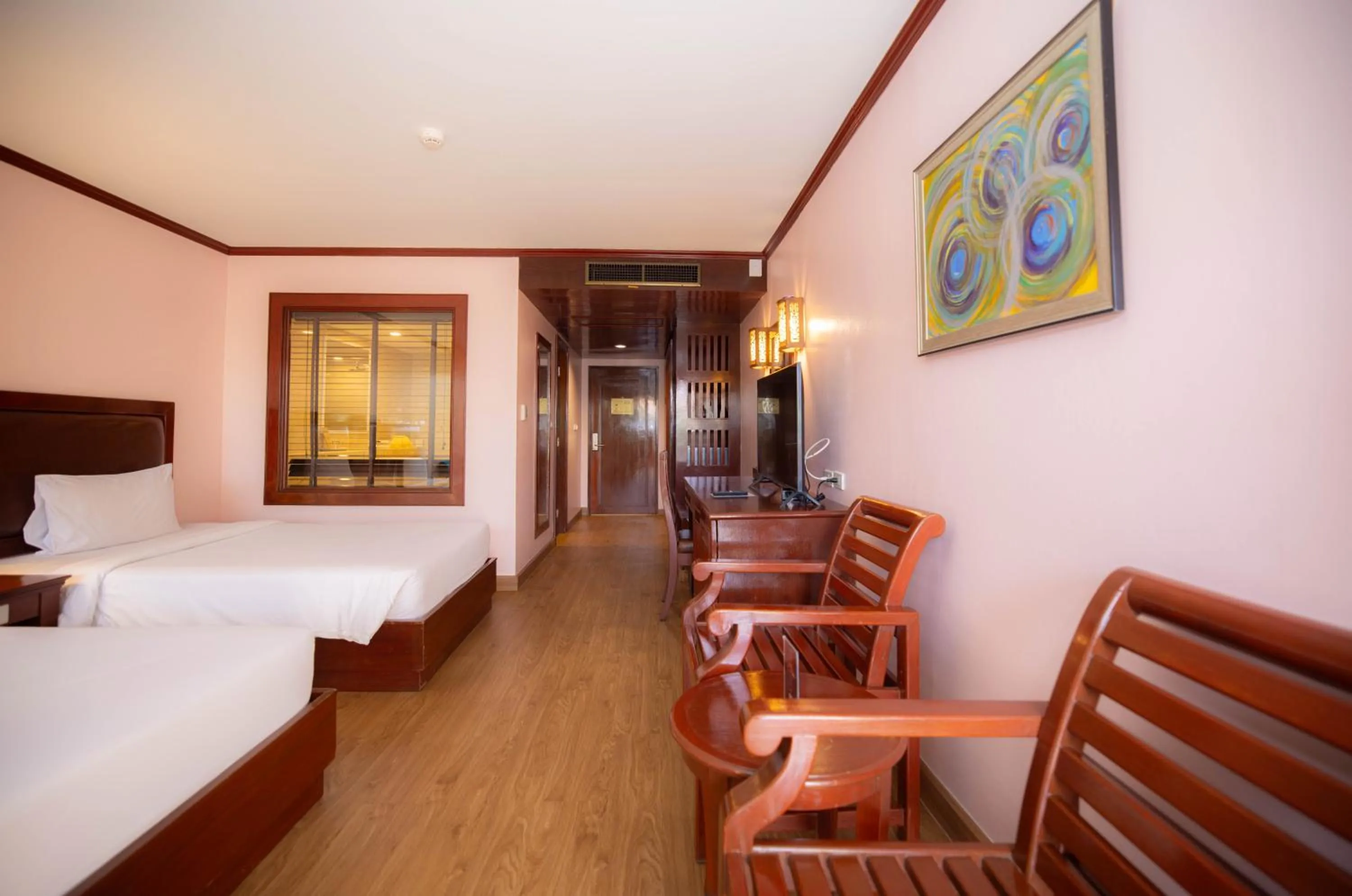 Bed in Baumanburi Hotel Patong