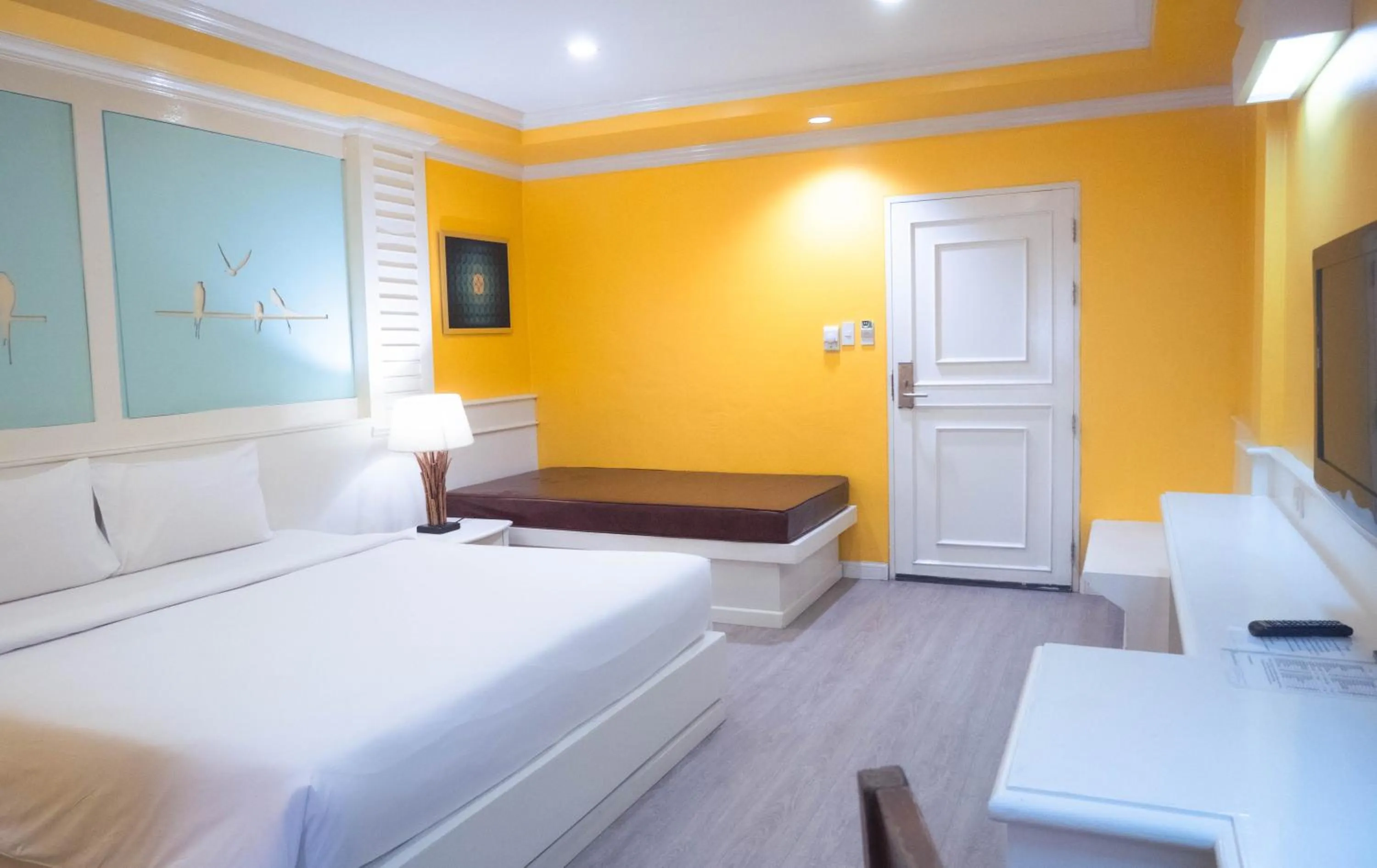 Bed in Baumanburi Hotel Patong